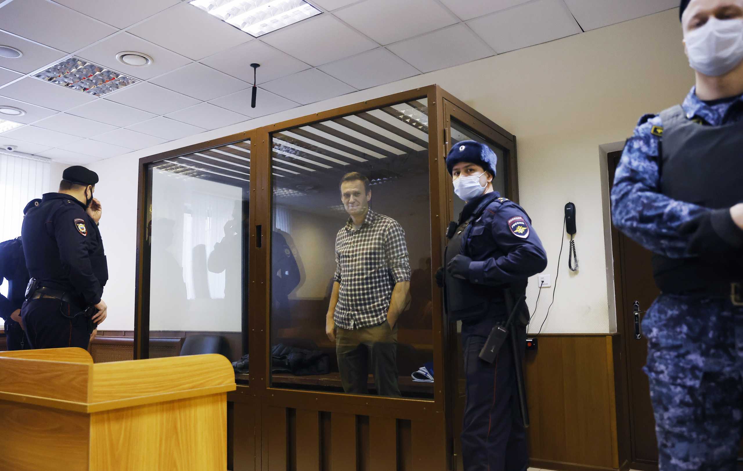 Russian opposition leader Alexei Navalny attends a hearing to consider an appeal against an earlier court decision to change his suspended sentence to a real prison term, in Moscow, Russia February 20, 2021. REUTERS