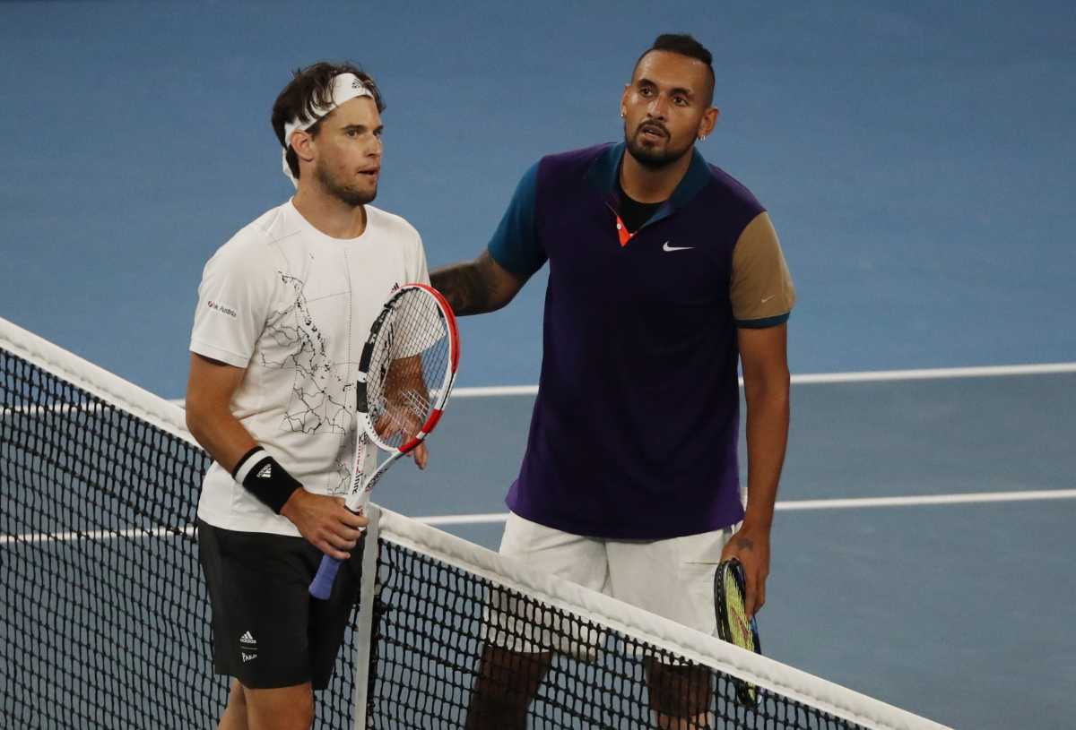 Tennis - Australian Open - Melbourne Park, Melbourne, Australia, February 12, 2021 Austria's Dominic Thiem with Australia's Nick Kyrgios after winning their third round match REUTERS