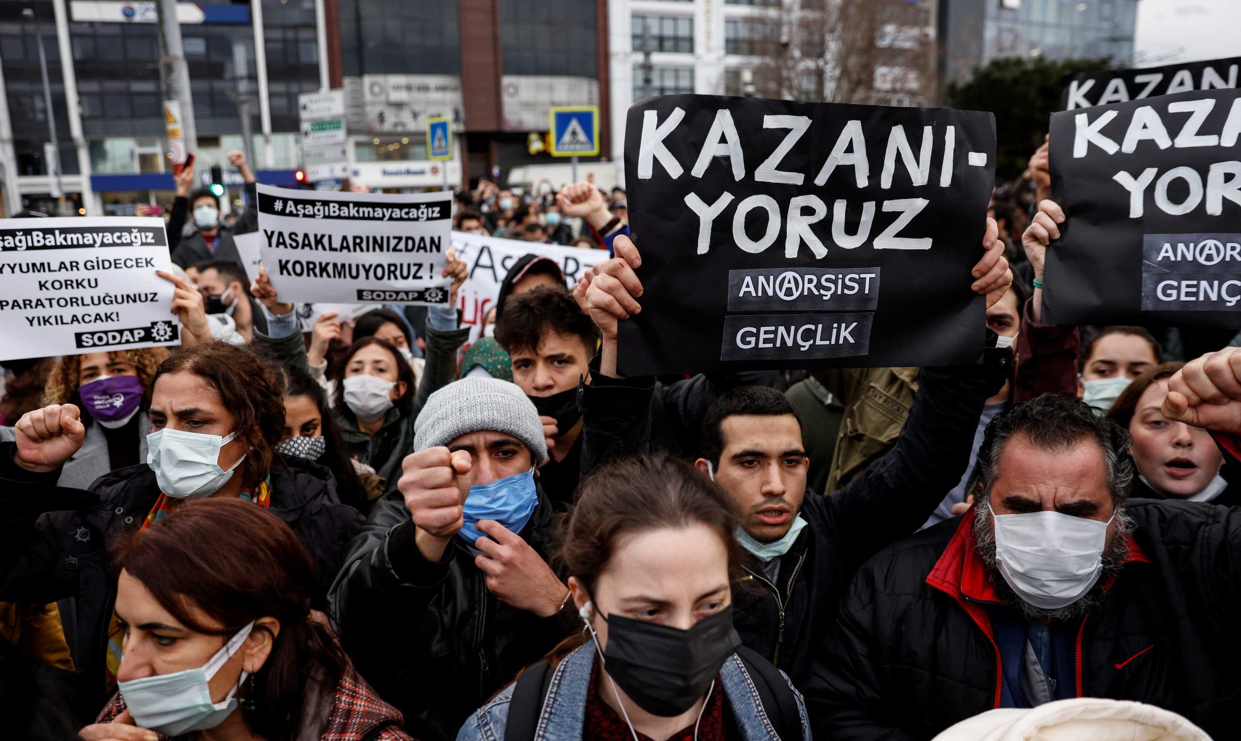 People shout slogans during a gathering in solidarity with Bogazici University students who are protesting against the appointment of Melih Bulu as new rector of the university, in Istanbul, Turkey, February 2, 2021. REUTERS