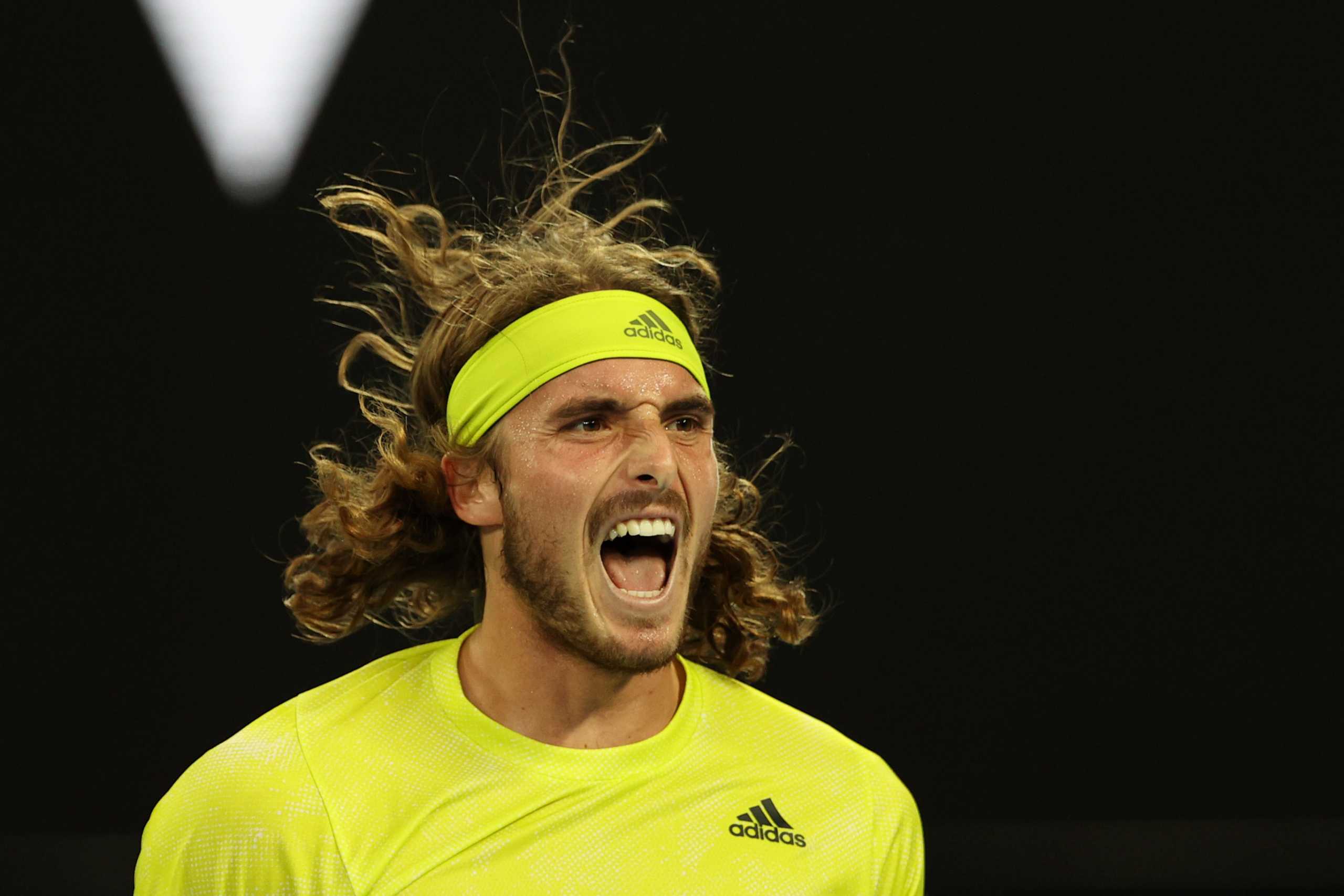Tennis - Australian Open - Melbourne Park, Melbourne, Australia, February 11, 2021 Greece's Stefanos Tsitsipas celebrates after winning his second round match against Australia's Thanasi Kokkinakis REUTERS