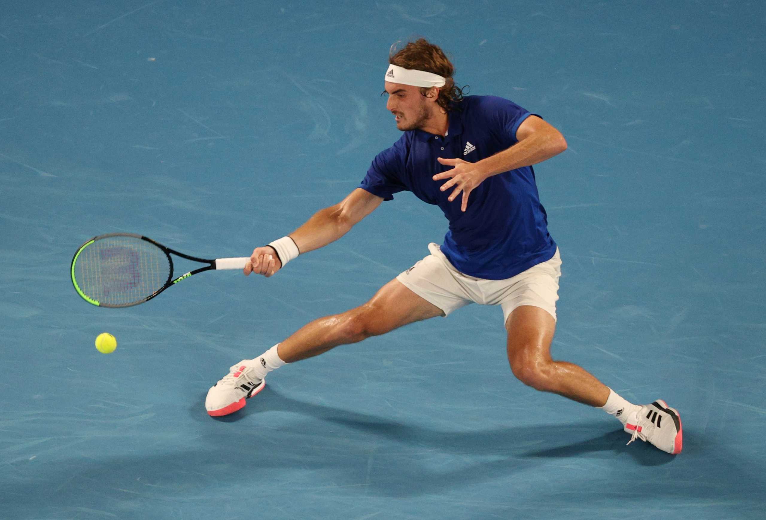 Tennis - ATP Cup - Melbourne Park, Melbourne, Australia - February 3, 2021 Greece's Stefanos Tsitsipas in action during his ground stage match against Australia's Alex de Minaur REUTERS