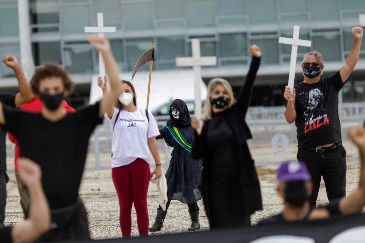 Demonstrators take part in a protest against Brazil's President Jair Bolsonaro and his handling of the coronavirus disease (COVID-19) outbreak, in Brasilia, Brazil, March 19, 2021. REUTERS