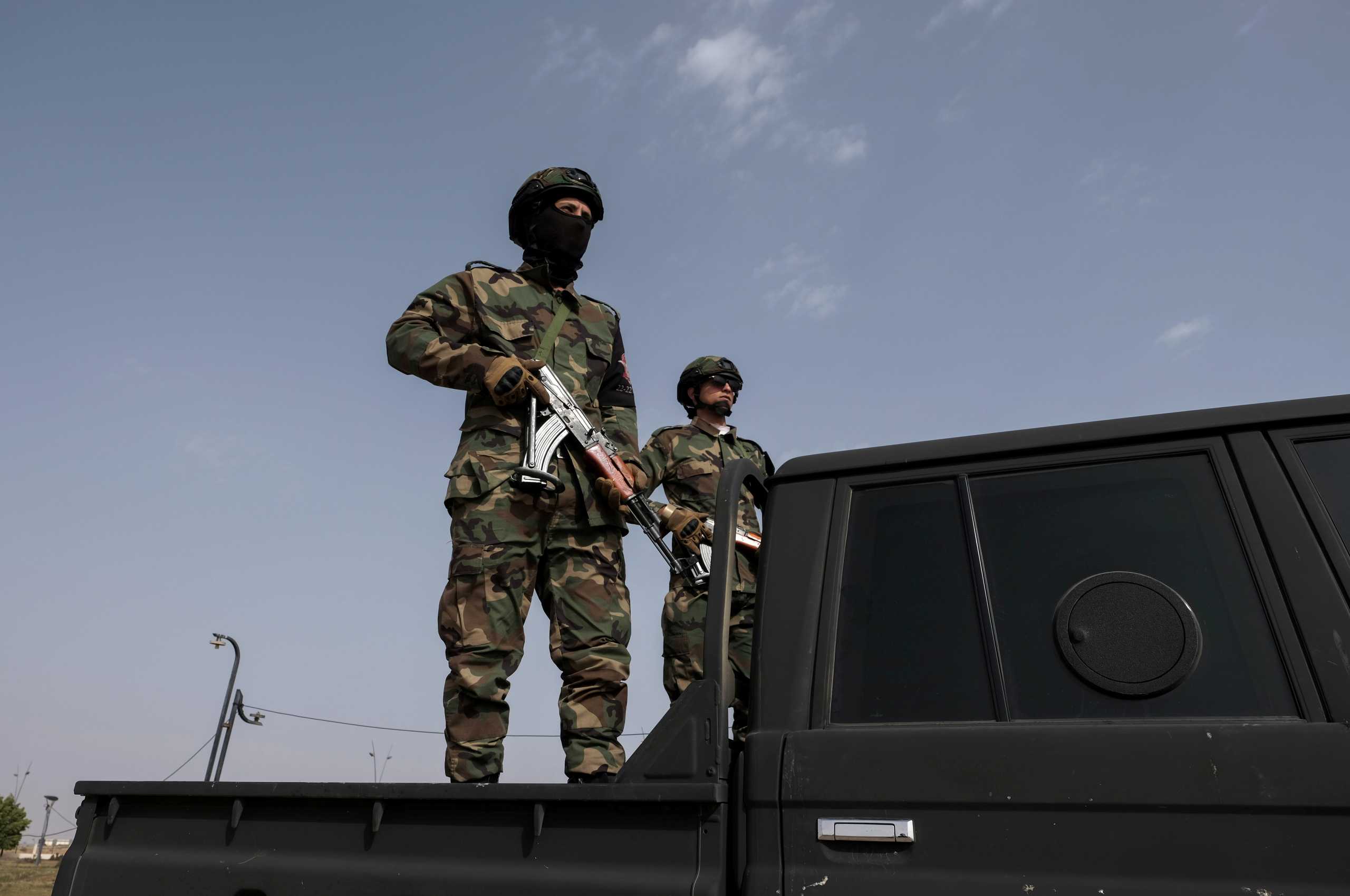 Security forces stand guard before the arrival of Libya's new Prime Minister Abdulhamid Dbeibeh, in Sirte, Libya March 8, 2021. REUTERS