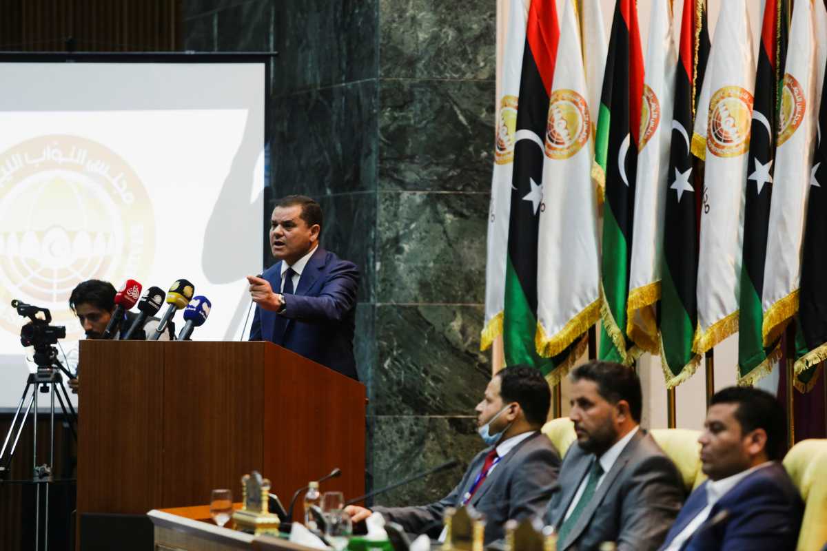 Libya's new Prime Minister Abdulhamid Dbeibeh gestures as he speaks in parliament in Sirte, Libya March 9, 2021. REUTERS