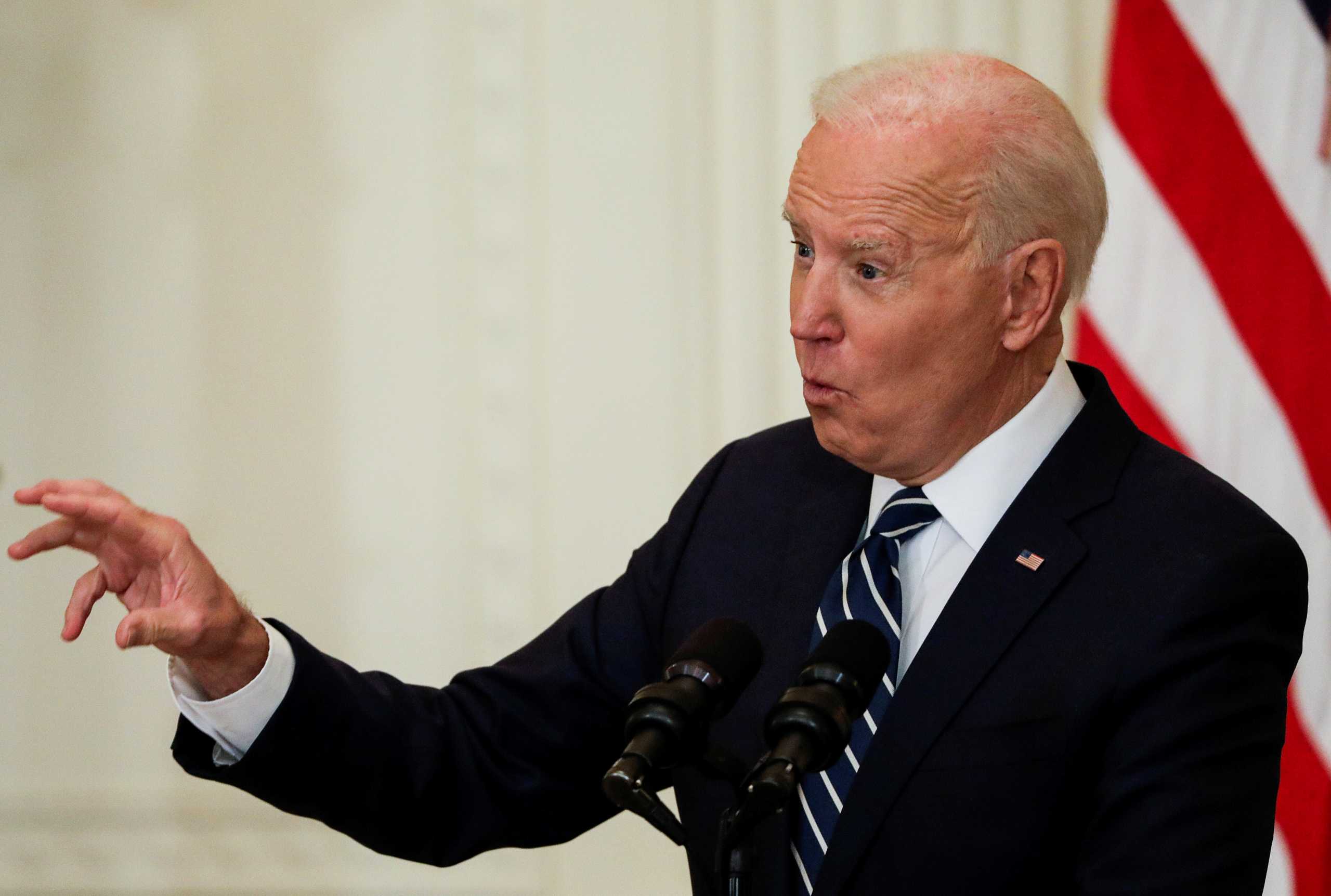 U.S. President Joe Biden takes questions as he holds his first formal news conference in the East Room of the White House in Washington, U.S., March 25, 2021. REUTERS
