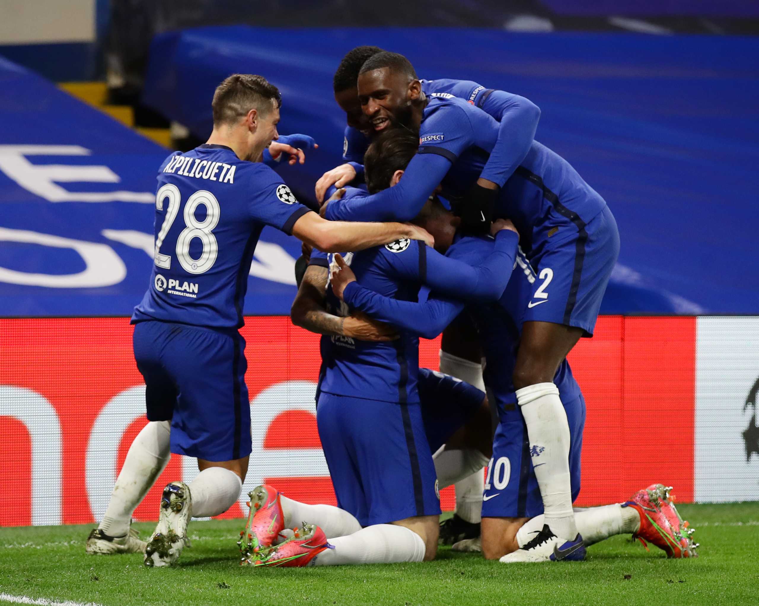 Soccer Football - Champions League -  Round of 16 Second Leg - Chelsea v Atletico Madrid - Stamford Bridge, London, Britain - March 17, 2021 Chelsea's Emerson celebrates scoring their second goal with teammates REUTERS
