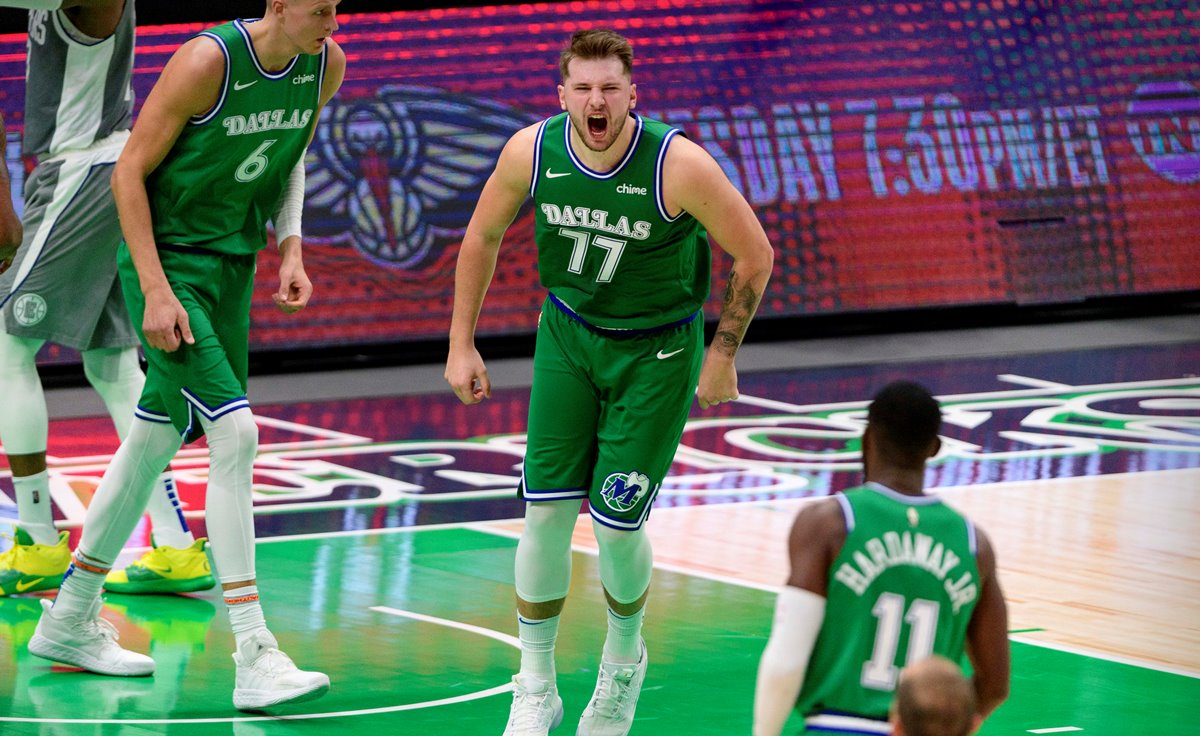Mar 17, 2021; Dallas, Texas, USA; Dallas Mavericks guard Luka Doncic (77) celebrates during the fourth quarter against the LA Clippers at the American Airlines Center. Mandatory Credit: Jerome Miron-USA TODAY Sports