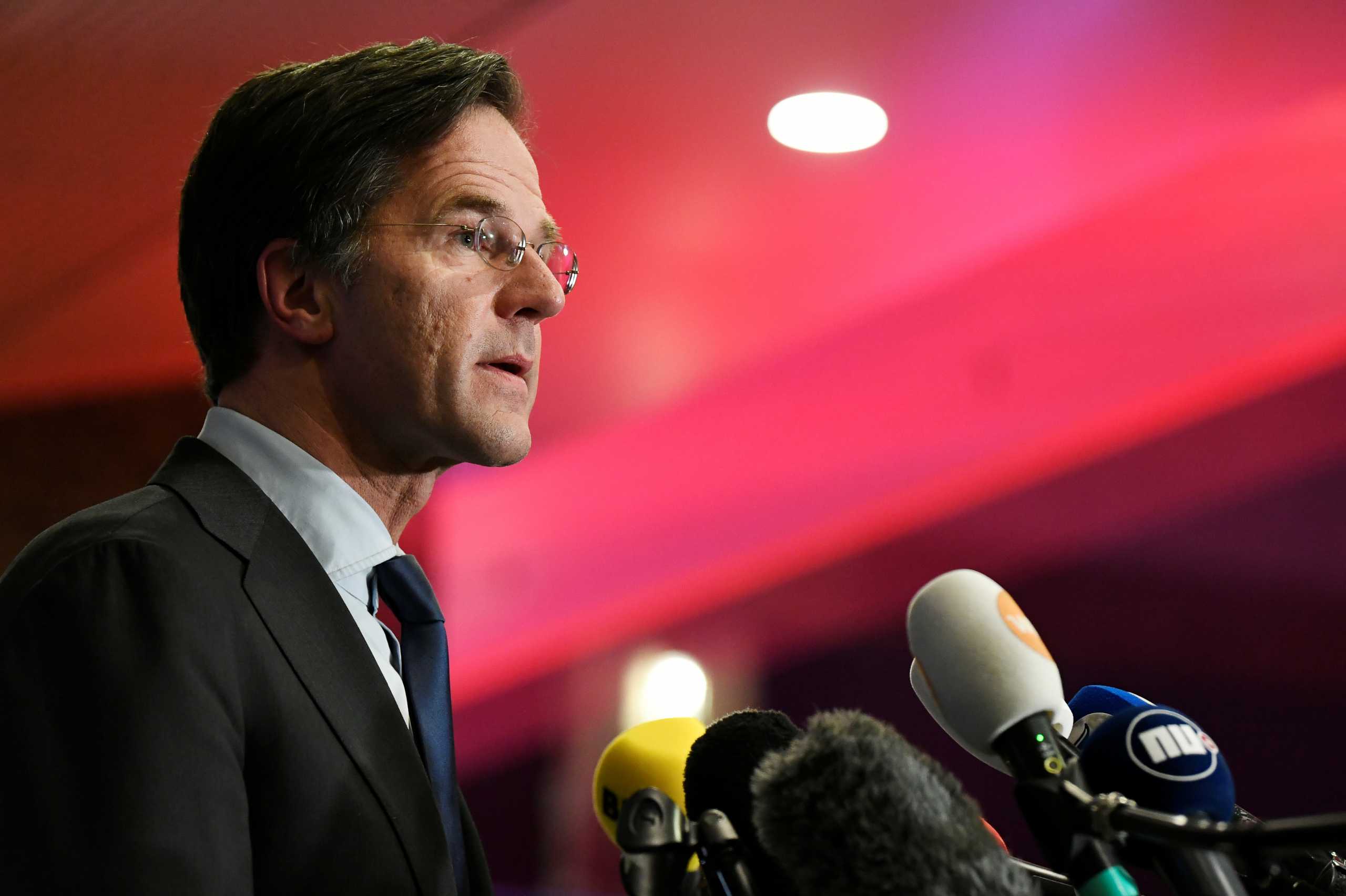 Dutch Prime Minister Mark Rutte reacts to the exit polls in the Netherlands' general election in The Hague, Netherlands, March 17, 2021. REUTERS