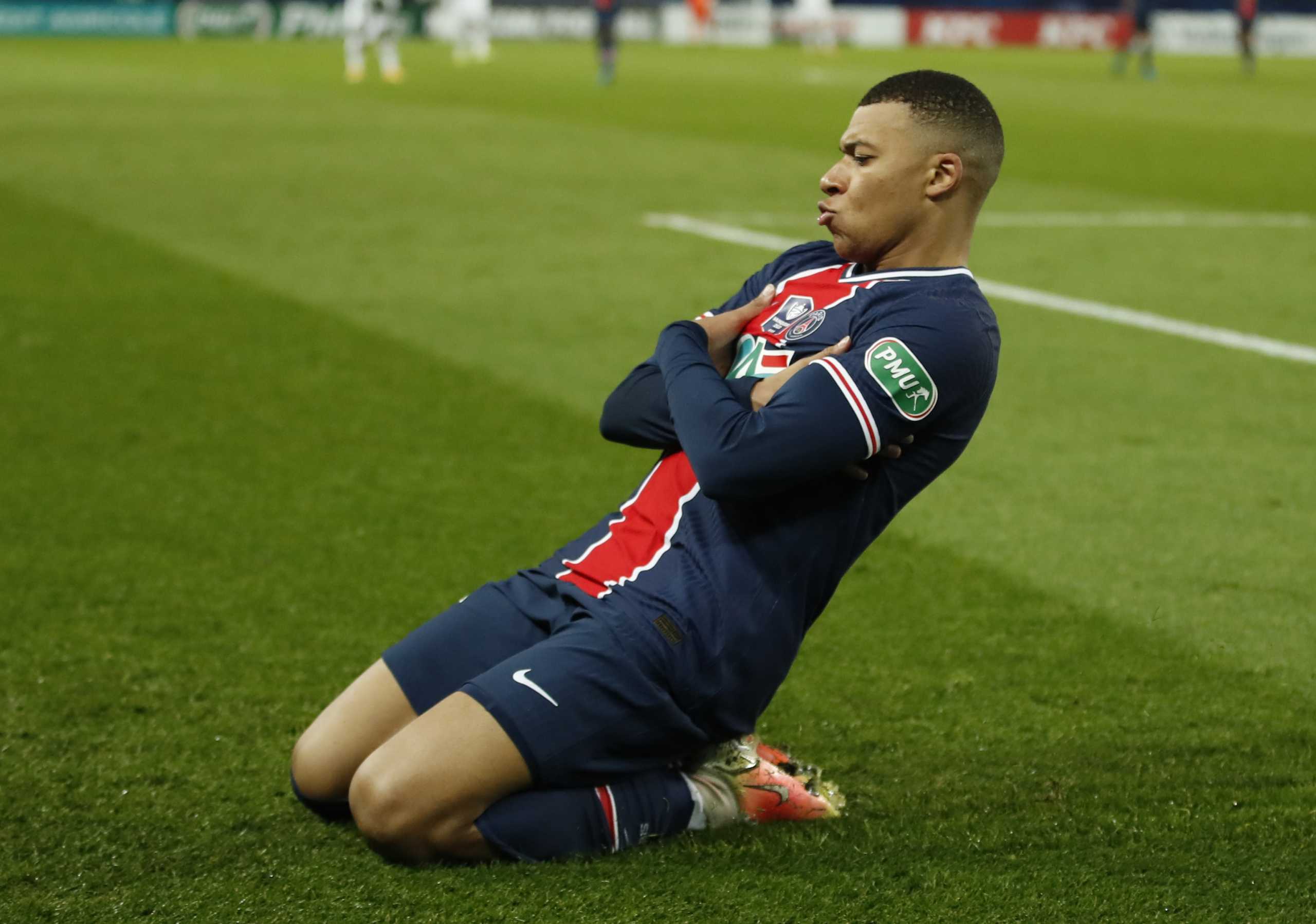 Soccer Football - French Cup - Round of 16 - Paris St Germain v Lille - Parc des Princes, Paris, France - March 17, 2021 Paris St Germain's Kylian Mbappe celebrates scoring their third goal REUTERS