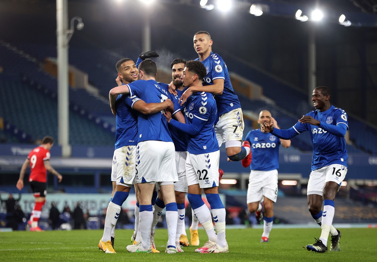 Soccer Football - Premier League - Everton v Southampton - Goodison Park, Liverpool, Britain - March 1, 2021 Everton's Michael Keane celebrates scoring their second goal with teammates before it is disallowed Pool via REUTERS