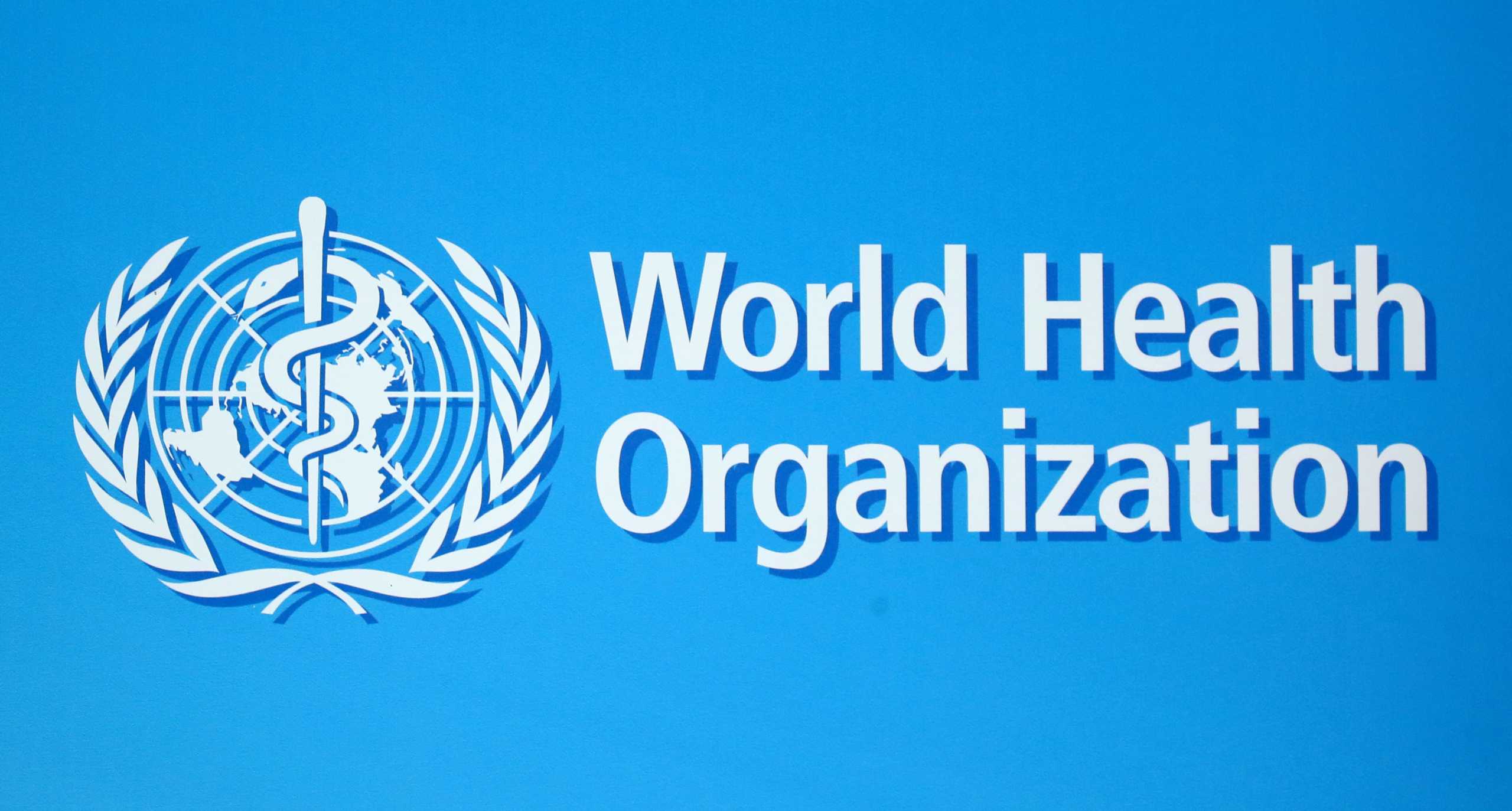 FILE PHOTO: The logo of the World Health Organization (WHO), is seen before a news conference in Geneva, Switzerland, June 25, 2020. REUTERS