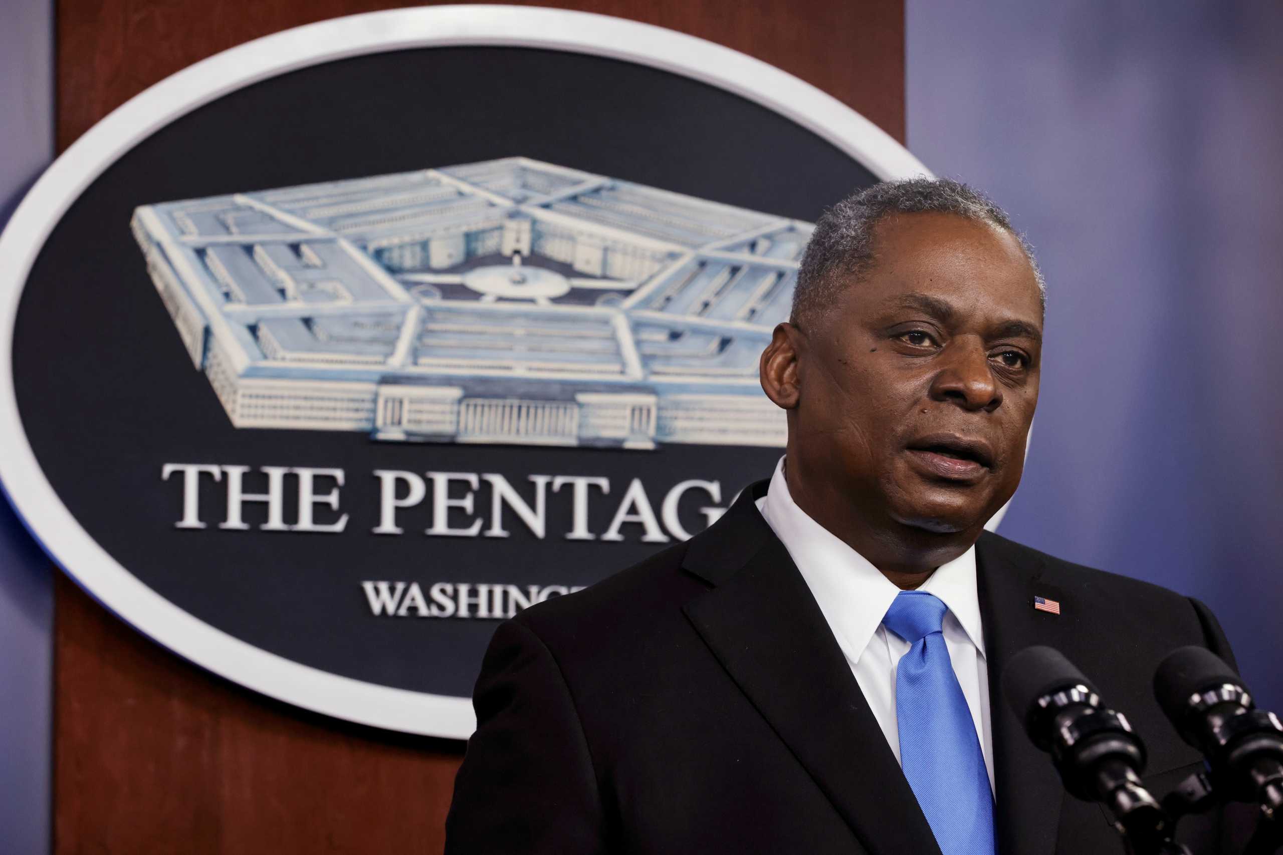 FILE PHOTO: U.S. Defense Secretary Lloyd Austin speaks to Defense Department personnel during a visit by U.S. President Joe Biden at the Pentagon in Arlington, Virginia, U.S., February 10, 2021. REUTERS