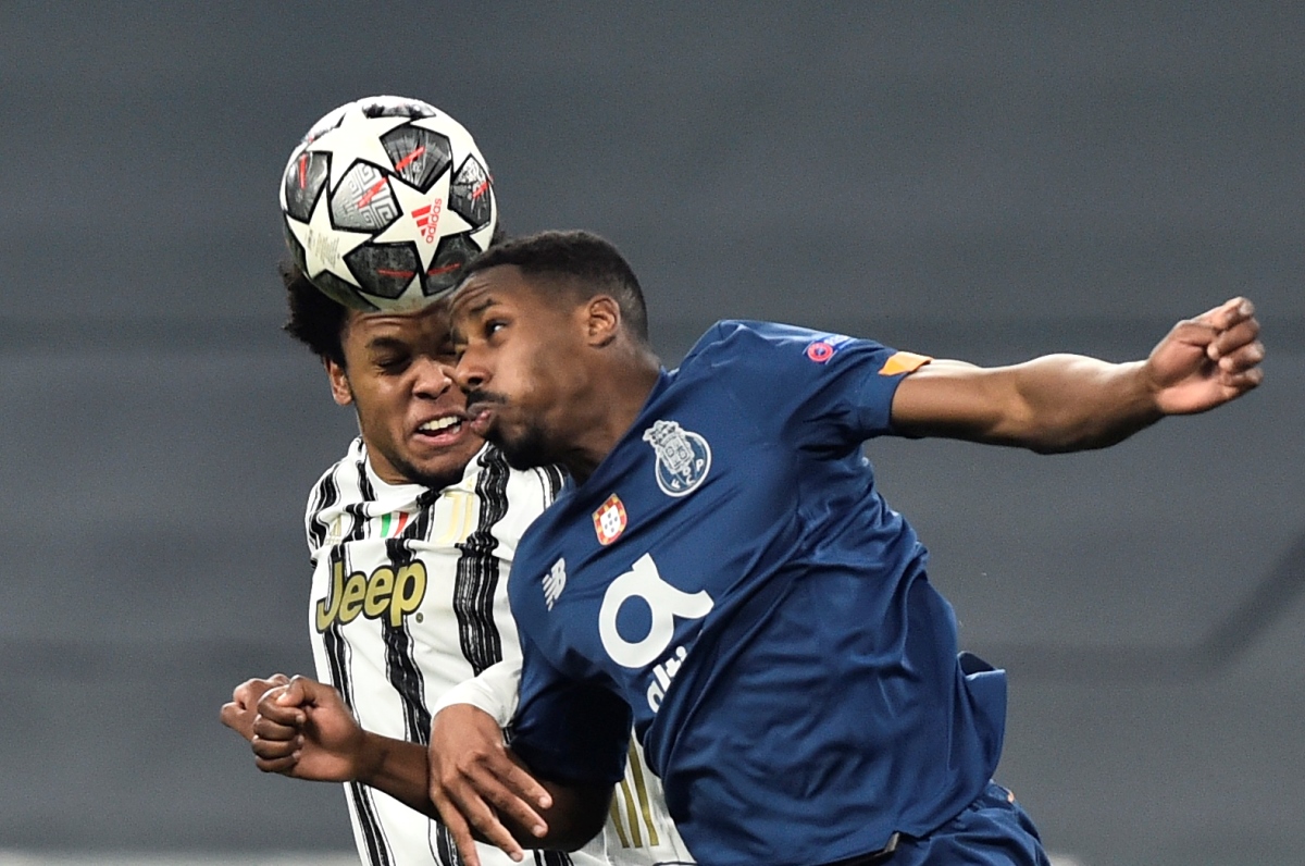 Soccer Football - Champions League - Round of 16 Second Leg - Juventus v FC Porto - Allianz Stadium, Turin, Italy - March 9, 2021 Juventus' Weston McKennie in action with FC Porto's Manafa REUTERS