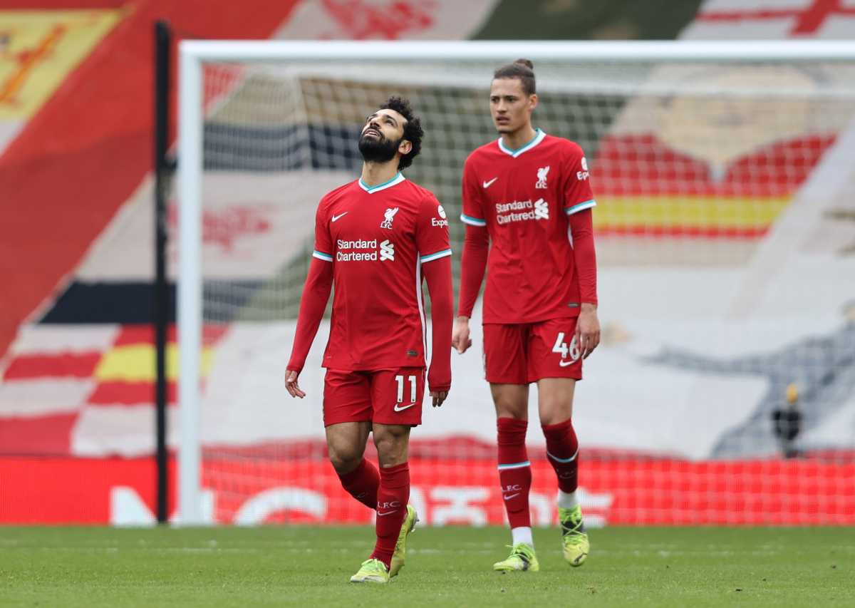 Soccer Football - Premier League - Liverpool v Fulham - Anfield, Liverpool, Britain - March 7, 2021  Liverpool's Mohamed Salah reacts after conceding their first goal scored by Fulham's Mario Lemina Pool via REUTERS