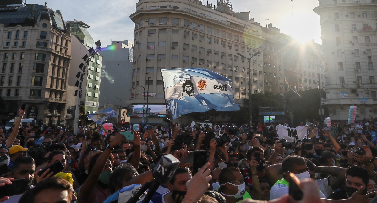 Fans of late Argentine soccer legend Diego Armando Maradona gather during a protest to demand justice after the death of the idol, at the Buenos Aires' Obelisk, Argentina March 10, 2021. REUTERS