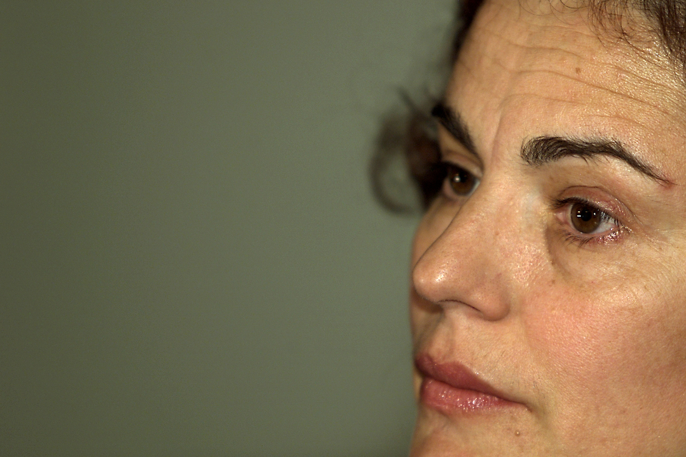 FILE PHOTO: Romanian actress Maia Morgenstern, who portrays Virgin Mary in Mel Gibson's "The Passion of the Christ", answers questions during a press conference after the Romanian premiere of the movie in Bucharest April 16, 2004.  REUTERS