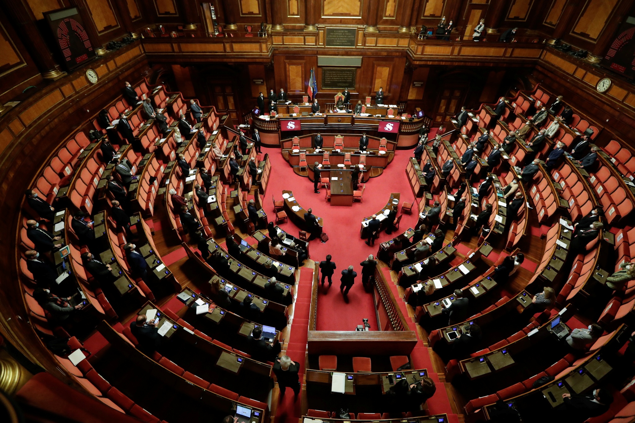Lawmakers at the Senate observe a moment of silence during Italian Foreign Minister Luigi di Maio's address on the killing of the Italian ambassador to the Democratic Republic of Congo Luca Attanasio and his bodyguard, in Rome, Italy, February 24, 2021. Andrew Medichini