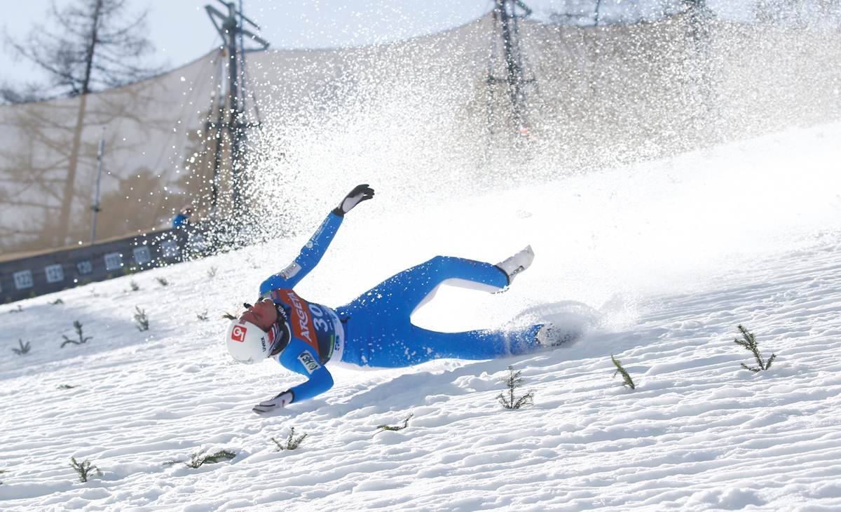 Ski Jumping - Ski Jumping World Cup - Planica, Slovenia - March 25, 2021 Norway's Daniel Andre Tande falls during his trial round jump REUTERS