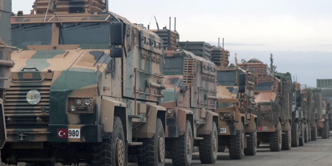 Turkish military vehicles are seen in Hazano near Idlib, Syria, February 11, 2020. REUTERS