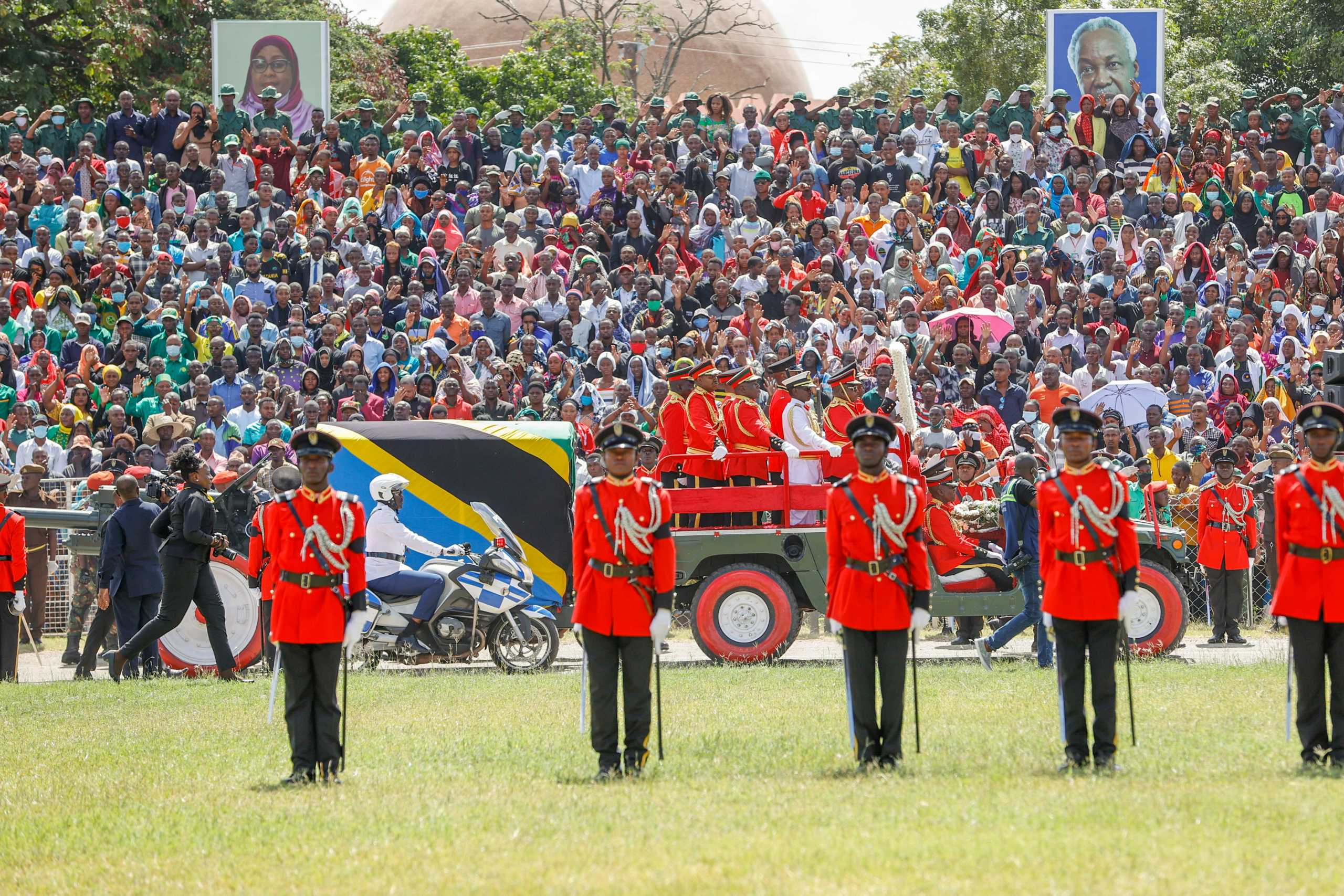 Military officers escort a gun carriage carrying the coffin of late Tanzanian President John Magufuli draped in the national flag, during the State Funeral Procession at the Jamhuri Stadium in Dodoma, Tanzania March 22, 2021. Presidential Press Service