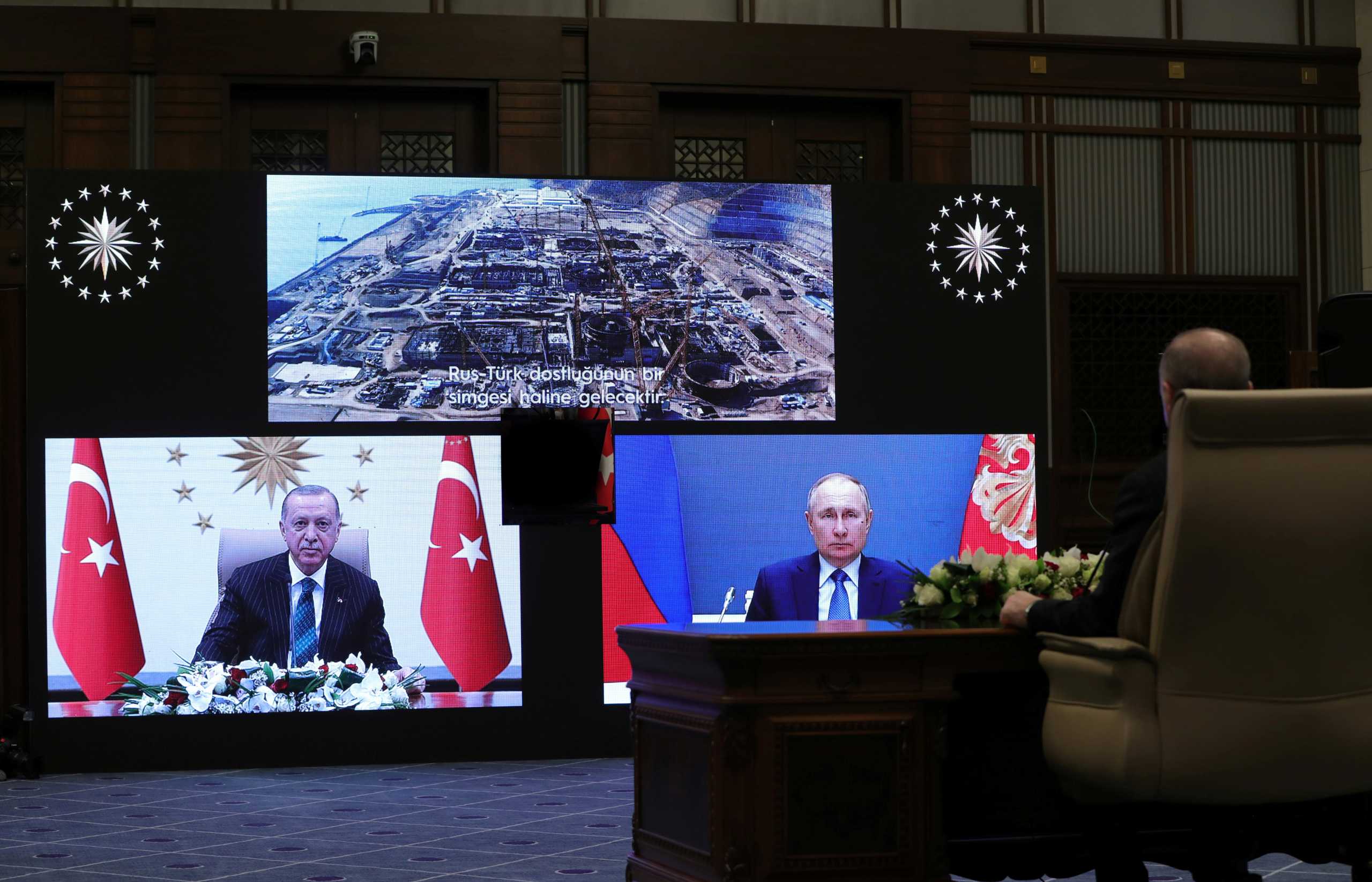 Turkish President Tayyip Erdogan attends a foundation-laying ceremony for the third reactor of the Akkuyu nuclear plant with his Russian counterpart Vladimir Putin via video link in Ankara, Turkey March 10, 2021. Presidential Press Office