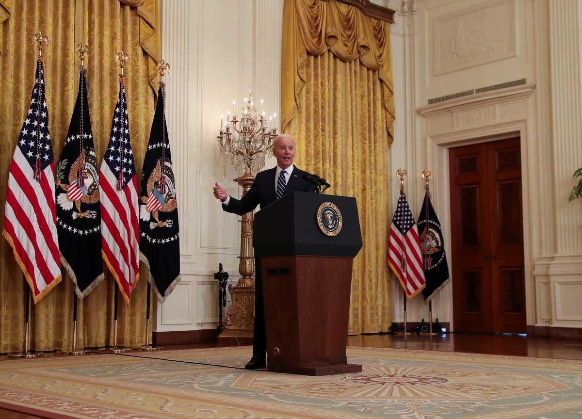 U.S. President Joe Biden speaks as he holds his first formal news conference in the East Room of the White House in Washington, U.S., March 25, 2021. REUTERS