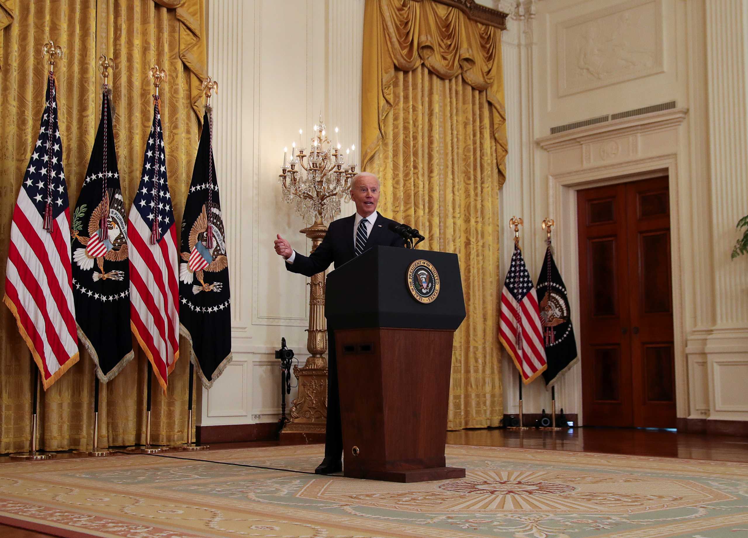 U.S. President Joe Biden speaks as he holds his first formal news conference in the East Room of the White House in Washington, U.S., March 25, 2021. REUTERS
