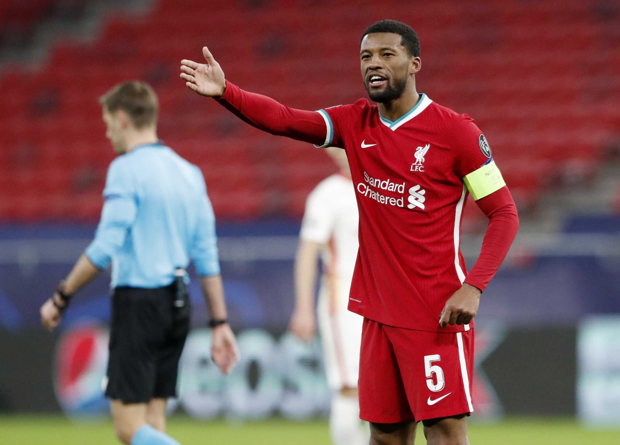 Soccer Football - Champions League - Round of 16 Second Leg - Liverpool v RB Leipzig - Puskas Arena, Budapest, Hungary - March 10, 2021 Liverpool's Georginio Wijnaldum reacts REUTERS