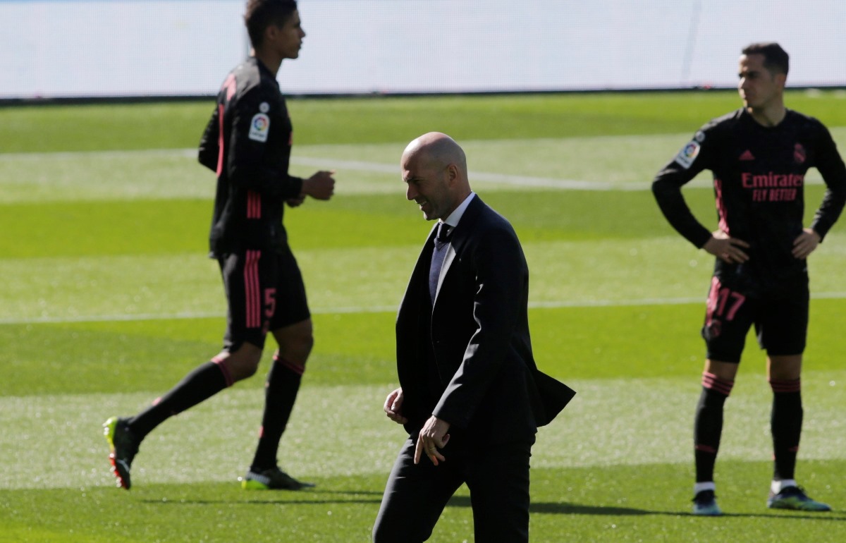 Soccer Football - La Liga Santander - Celta Vigo v Real Madrid - Estadio de Balaidos, Vigo, Spain - March 20, 2021  Real Madrid coach Zinedine Zidane on the pitch before the match REUTERS