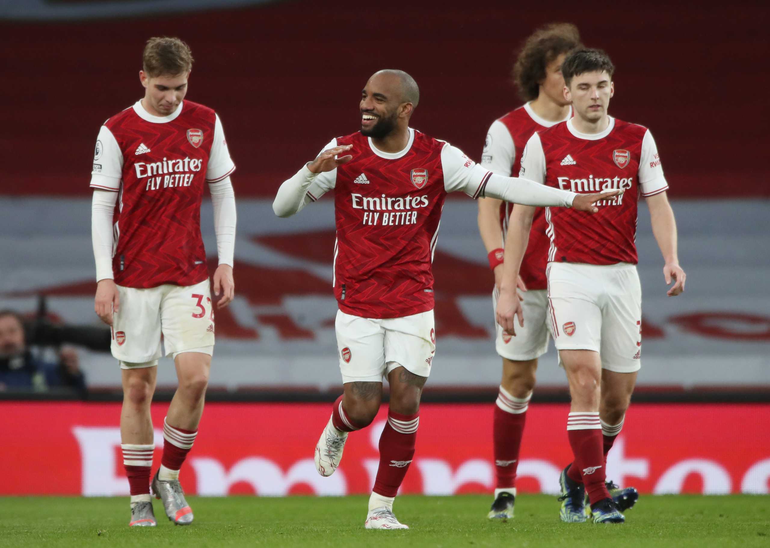 Soccer Football - Premier League - Arsenal v Tottenham Hotspur - Emirates Stadium, London, Britain - March 14, 2021 Arsenal's Alexandre Lacazette celebrates scoring their second goal Pool via REUTERS