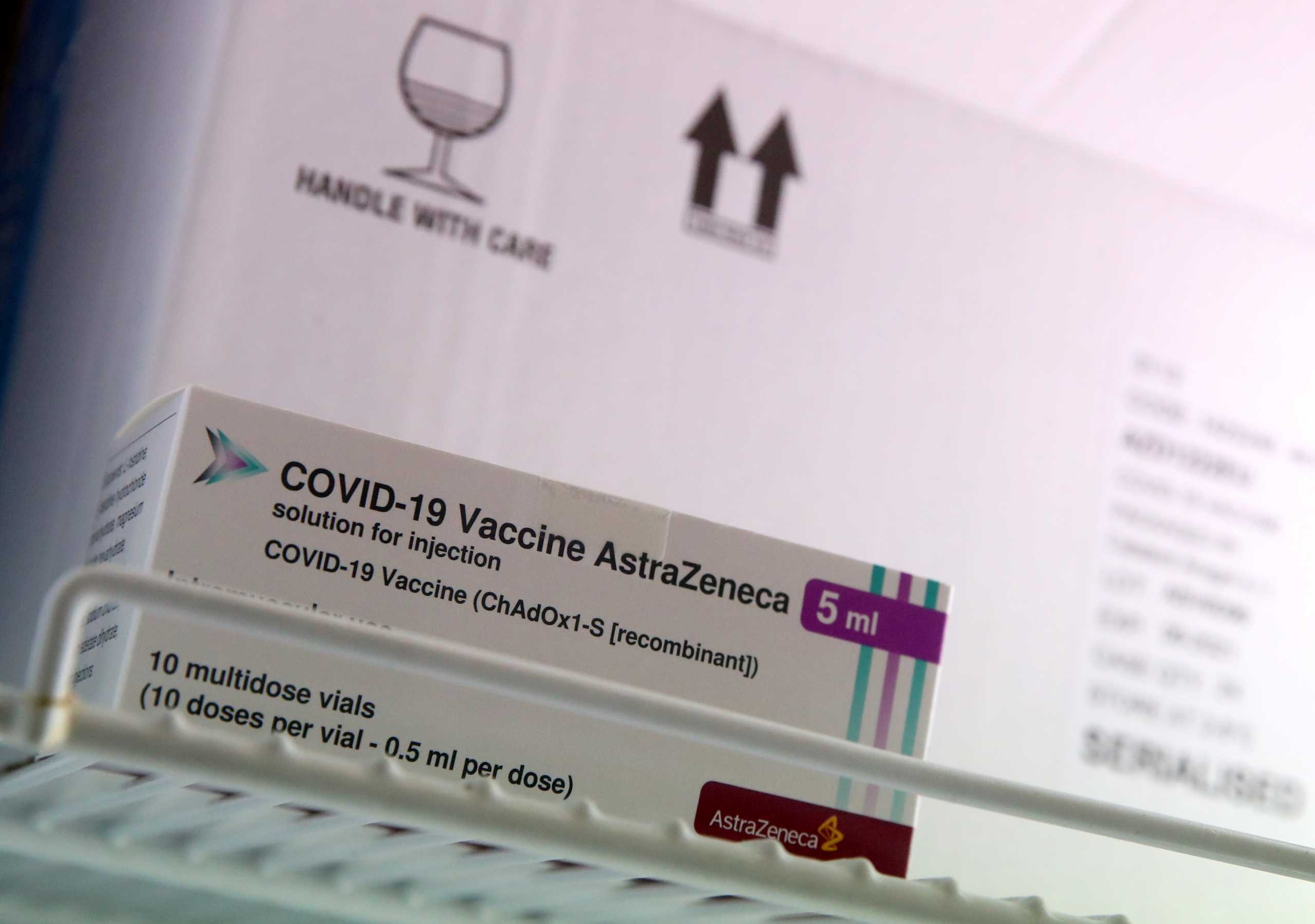 A box of AstraZeneca COVID-19 vaccine is seen in a fridge amid a vaccination campaign in Ronquieres, Belgium March 15, 2021. REUTERS