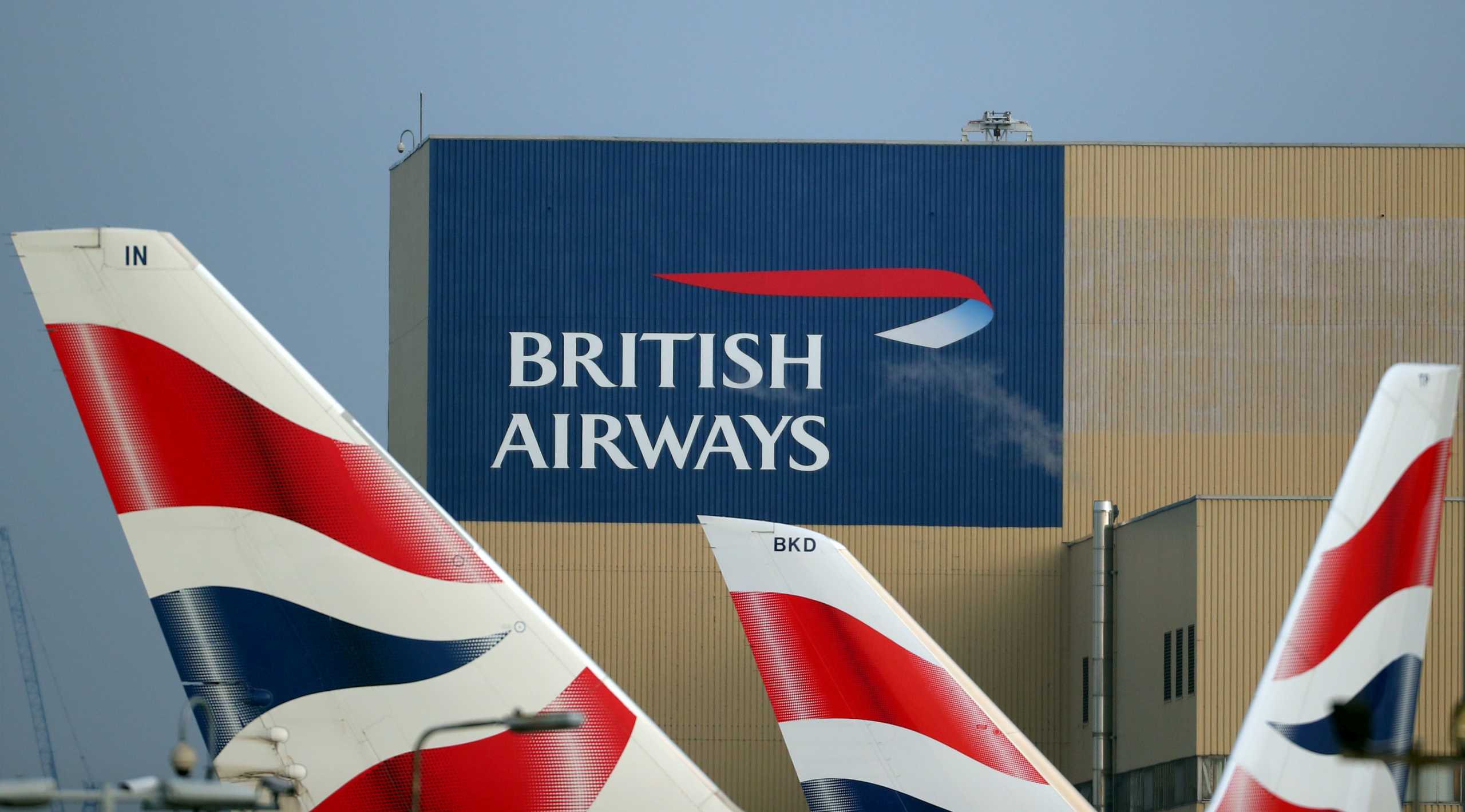FILE PHOTO: British Airways logos are seen on tail fins at Heathrow Airport in west London, Britain, February 23, 2018. REUTERS