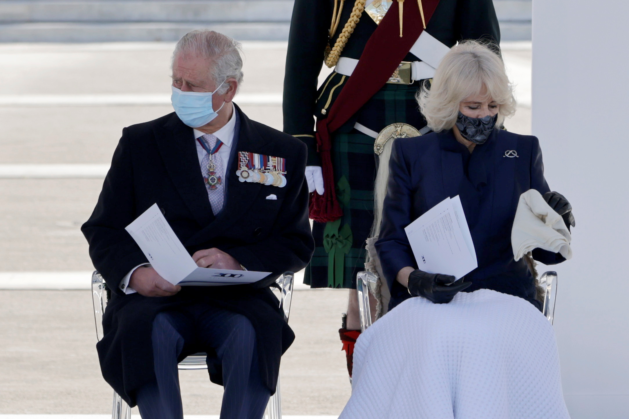 Britain's Prince Charles and Camilla, Duchess of Cornwall, attend a military parade during celebrations for the 200th anniversary of the Greek War of Independence, in Athens, Greece March 25, 2021. REUTERS