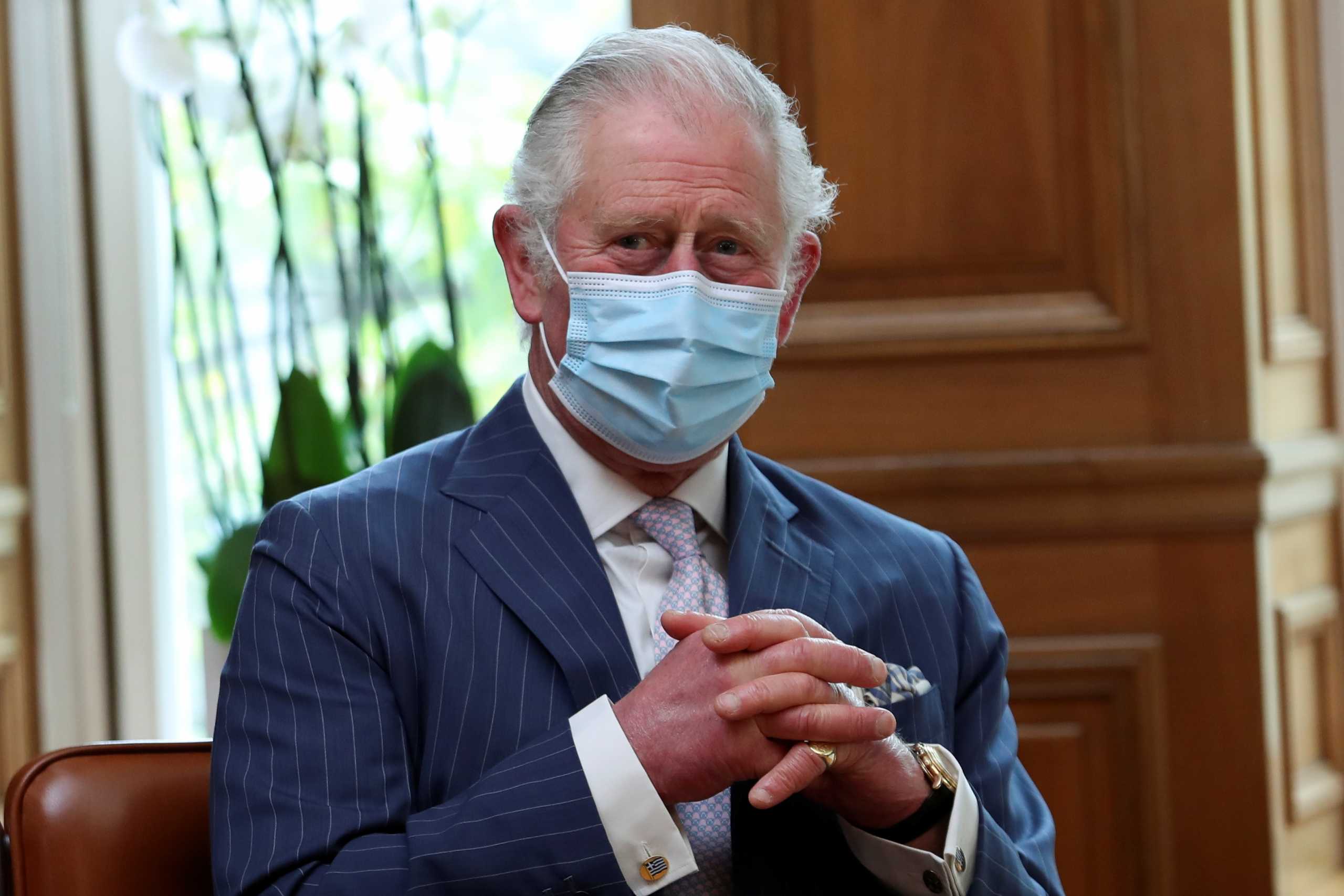 Britain's Prince Charles looks on as he meets with Greek Prime Minister Kyriakos Mitsotakis (not seen) at the Maximos Mansion during celebrations for the 200th anniversary of the Greek War of Independence, in Athens, Greece, March 25, 2021. REUTERS