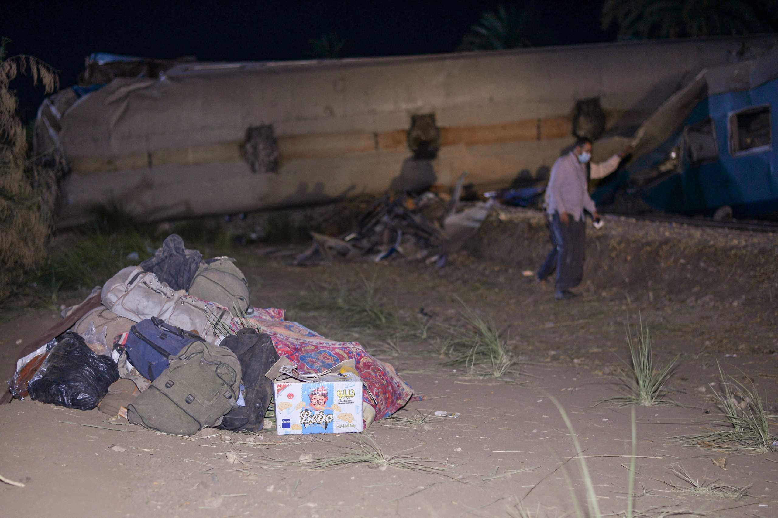 Belongings are seen near the site where two trains have collided near the city of Sohag, Egypt, March 26, 2021. Picture taken March 26, 2021 REUTERS