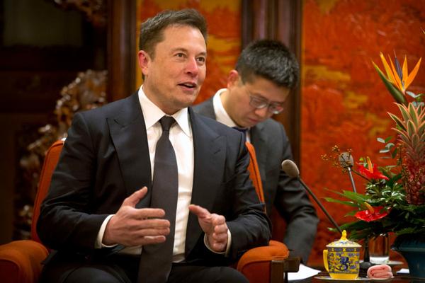 Tesla CEO Elon Musk speaks during a meeting with Chinese Premier Li Keqiang (not pictured) at the Zhongnanhai leadership compound in Beijing on January 9, 2019. (Photo by Mark Schiefelbein