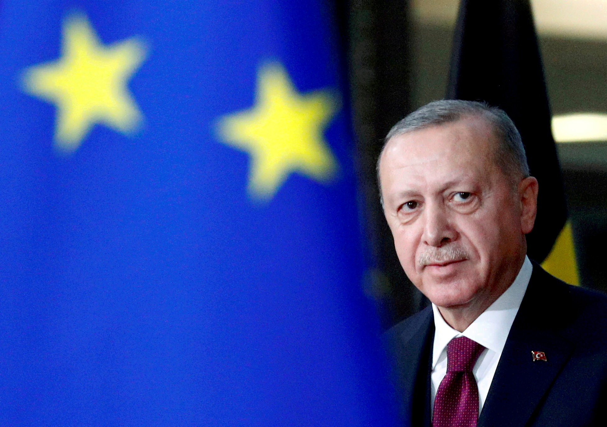 FILE PHOTO: Turkish President Tayyip Erdogan arrives for a meeting with EU Council President Charles Michel in Brussels, Belgium March 9, 2020. REUTERS