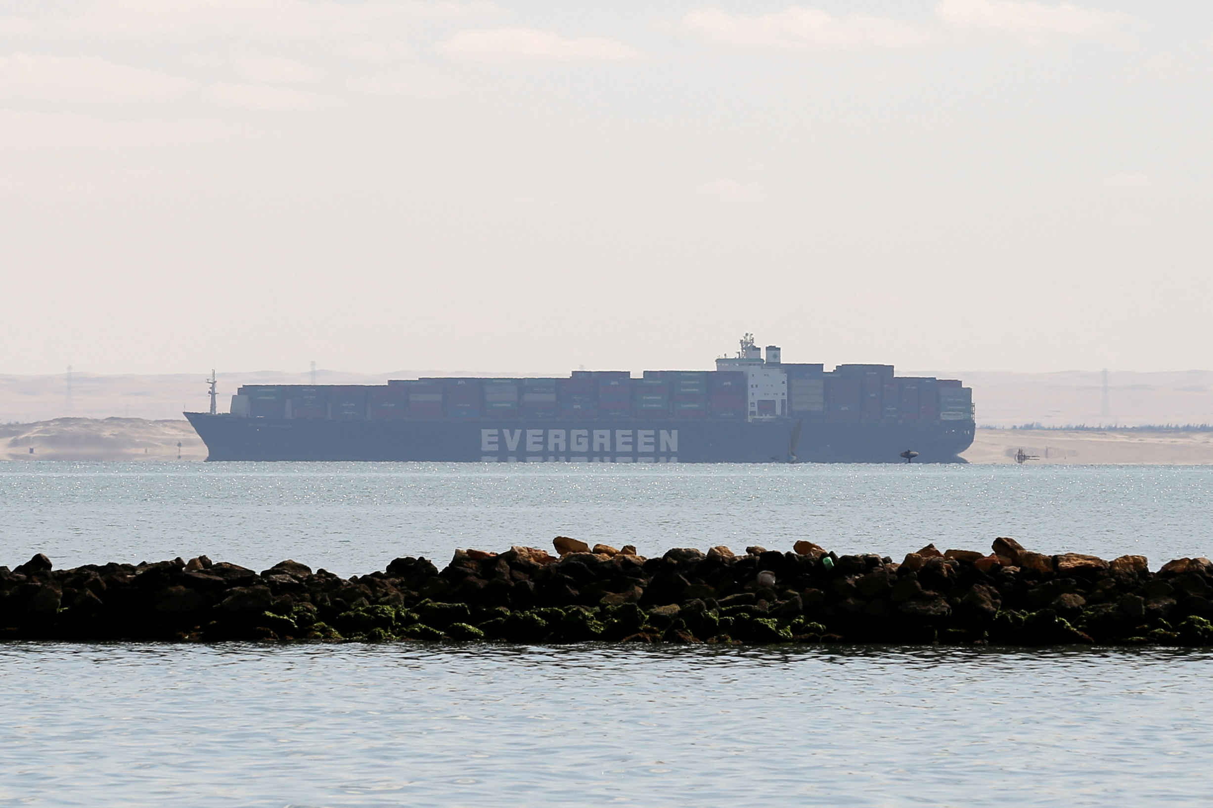 A ship is seen outside the Suez canal, near Ismailia, Egypt, March, 29, 2021. REUTERS