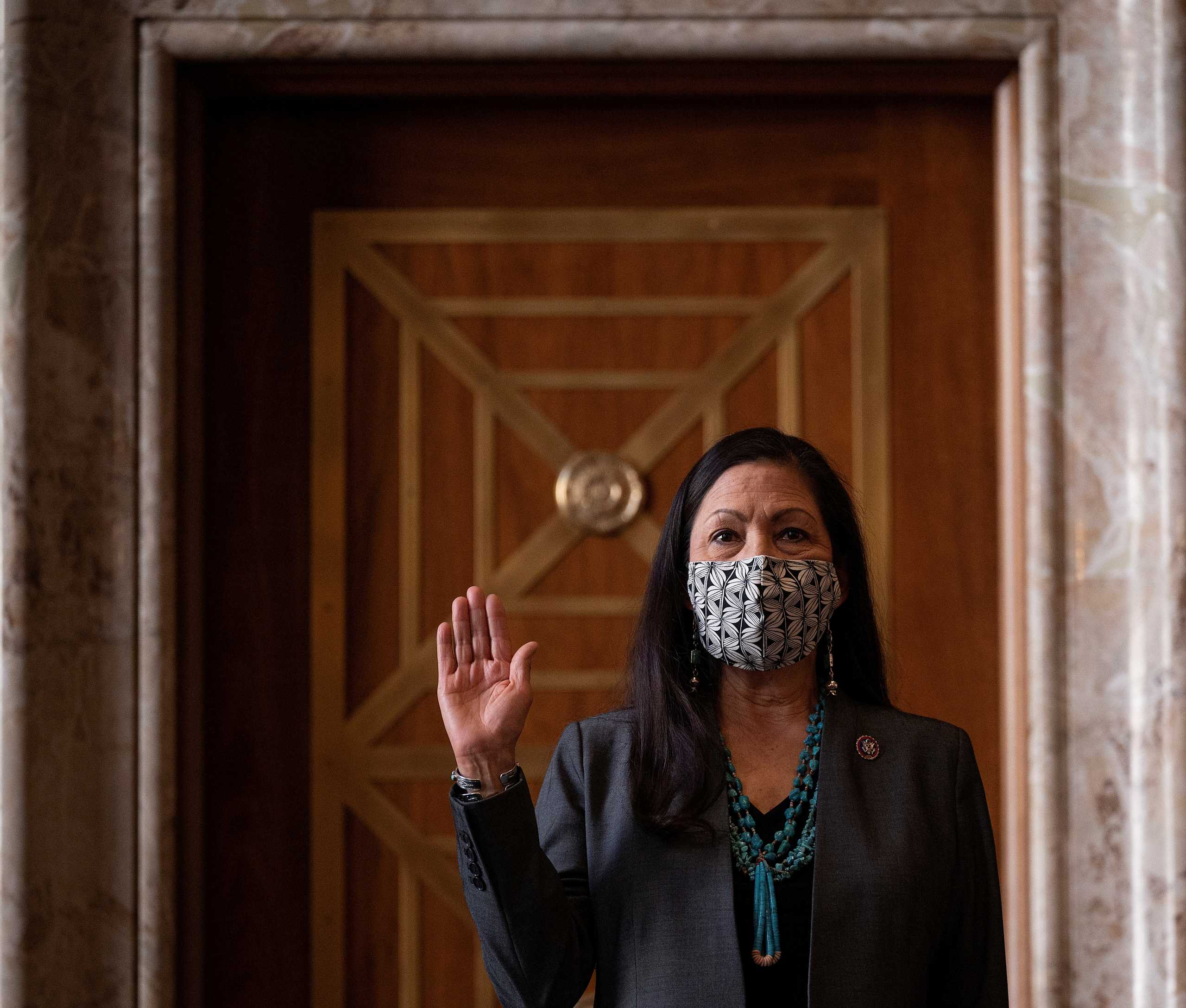 FILE PHOTO: Congresswoman Deb Haaland, D-N.M., is sworn in during the Senate Committee on Energy and Natural Resources hearing on her nomination to be Interior Secretary on Capitol Hill in Washington, DC, U.S. February 23, 2021.    Jim Watson