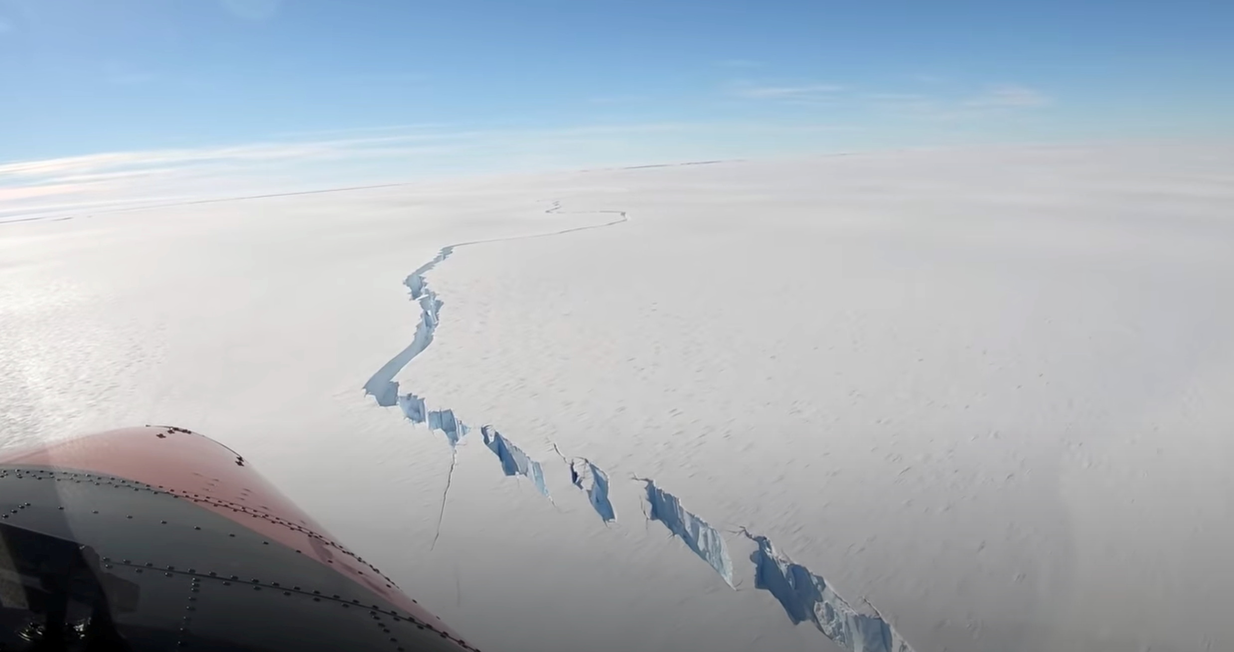 A chasm called the North Rift formed on the Brunt Ice Shelf is seen in Antarctica, February 26, 2021, in this still image obtained from social media video. BRITISH ANTARCTIC SURVEY