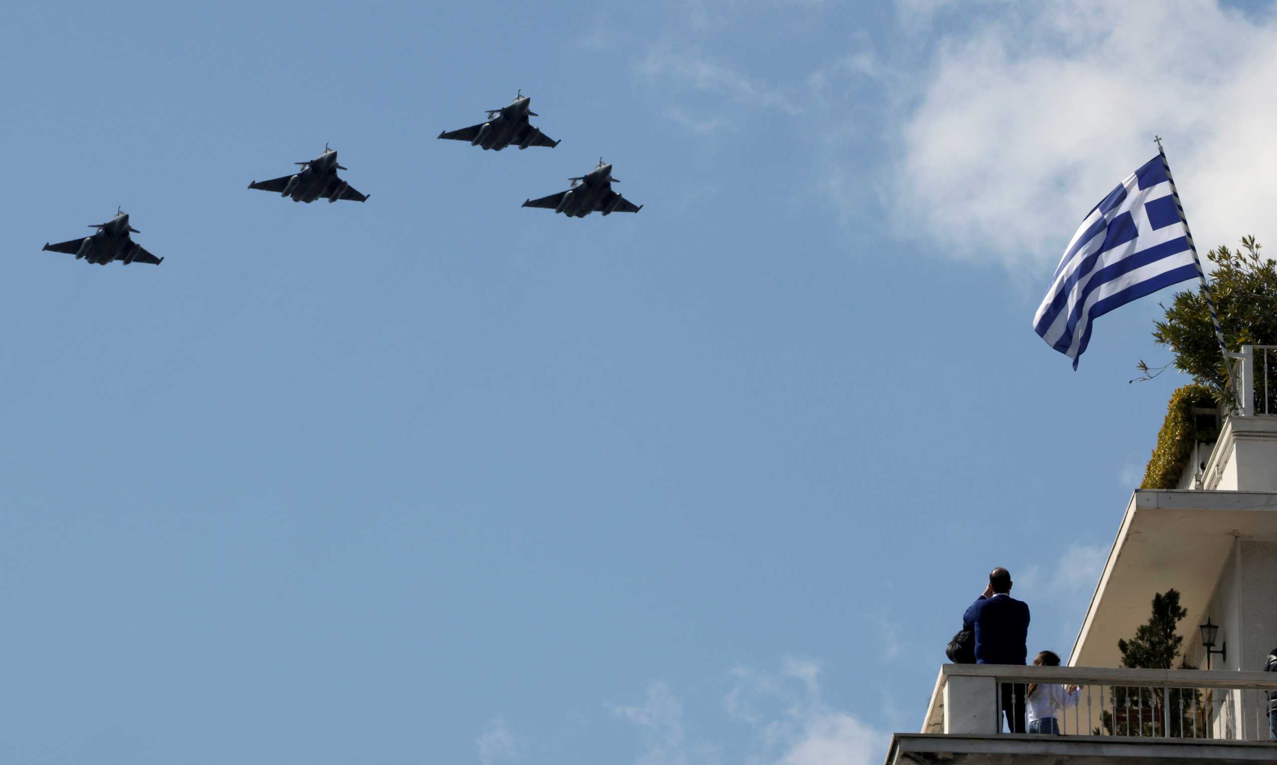 French Air Force fighter jets fly over Athens during a military parade marking the 200th anniversary of the Greek War of Independence, Greece March 25, 2021. REUTERS