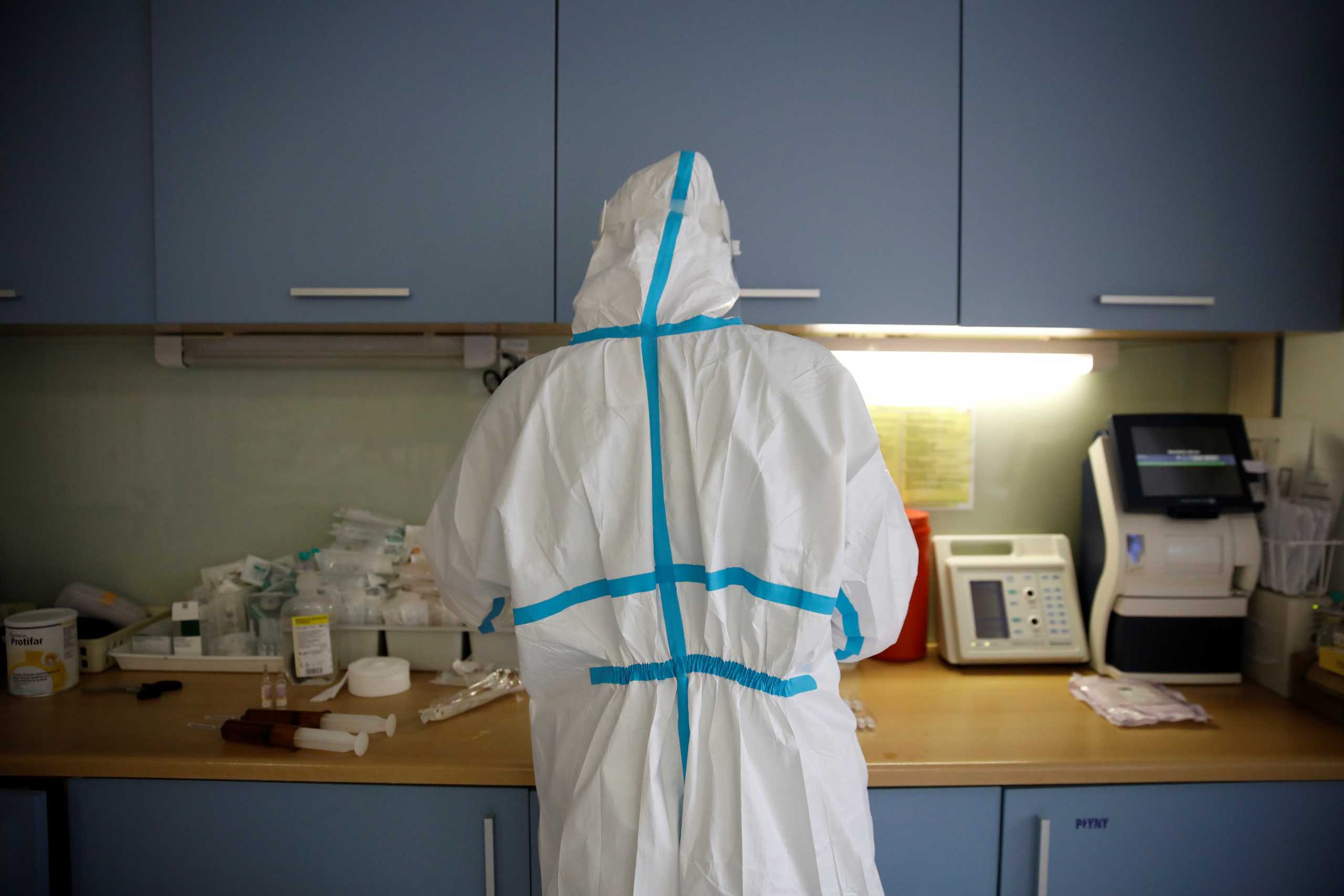 Medical staff member prepares medicines inside for extracorporeal membrane oxygenation (ECMO) at a coronavirus disease ward of the Interior and Administration Ministry (MSWiA) hospital in Warsaw, Poland, March 8, 2021. REUTERS