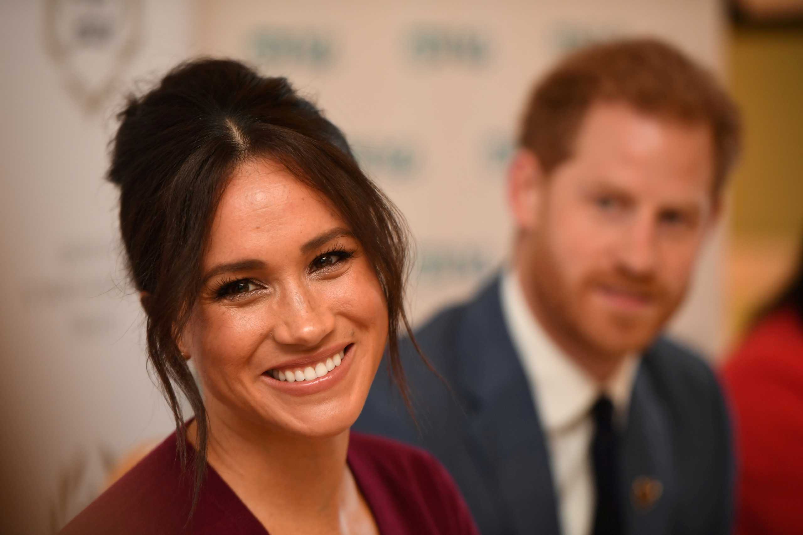 FILE PHOTO: Britain's Meghan, the Duchess of Sussex, and Prince Harry, Duke of Sussex, attend a roundtable discussion on gender equality with The Queen's Commonwealth Trust (QCT) and One Young World at Windsor Castle, Windsor, Britain October 25, 2019. Jeremy Selwyn