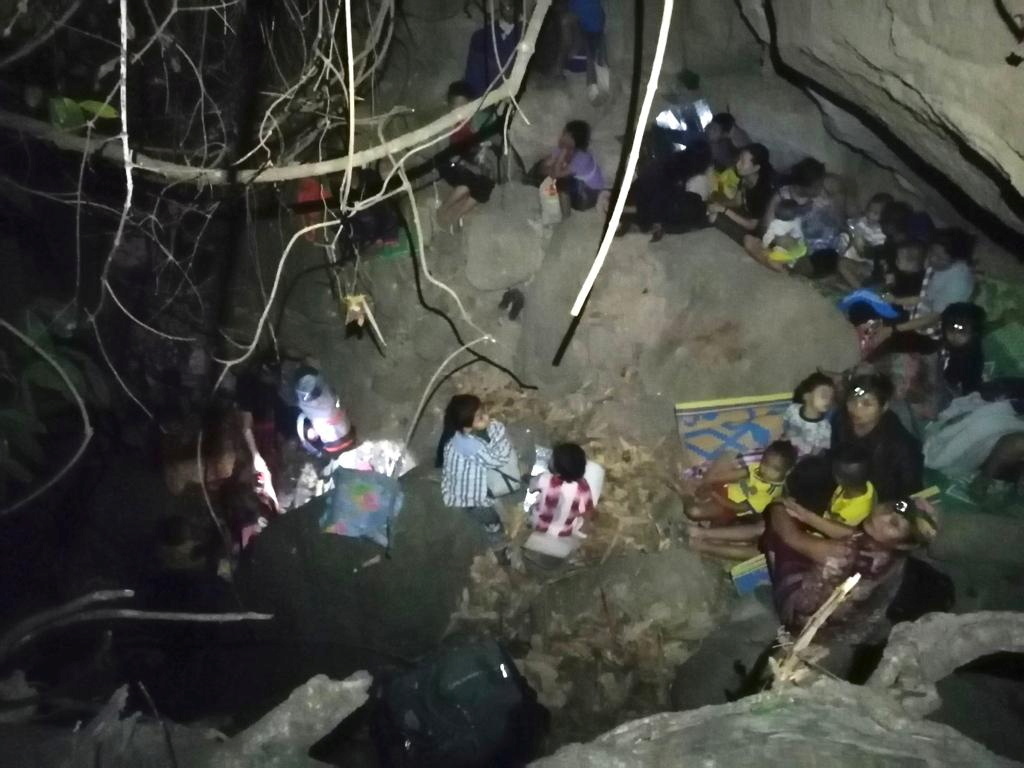 Ethnic Karen villagers displaced from Myanmar's Day Pu Noh village are seen in an unknown location in Karen state, after fleeing Burmese army air strikes, Myanmar March 27, 2021 in this picture obtained from social media. Free Burma Rangers