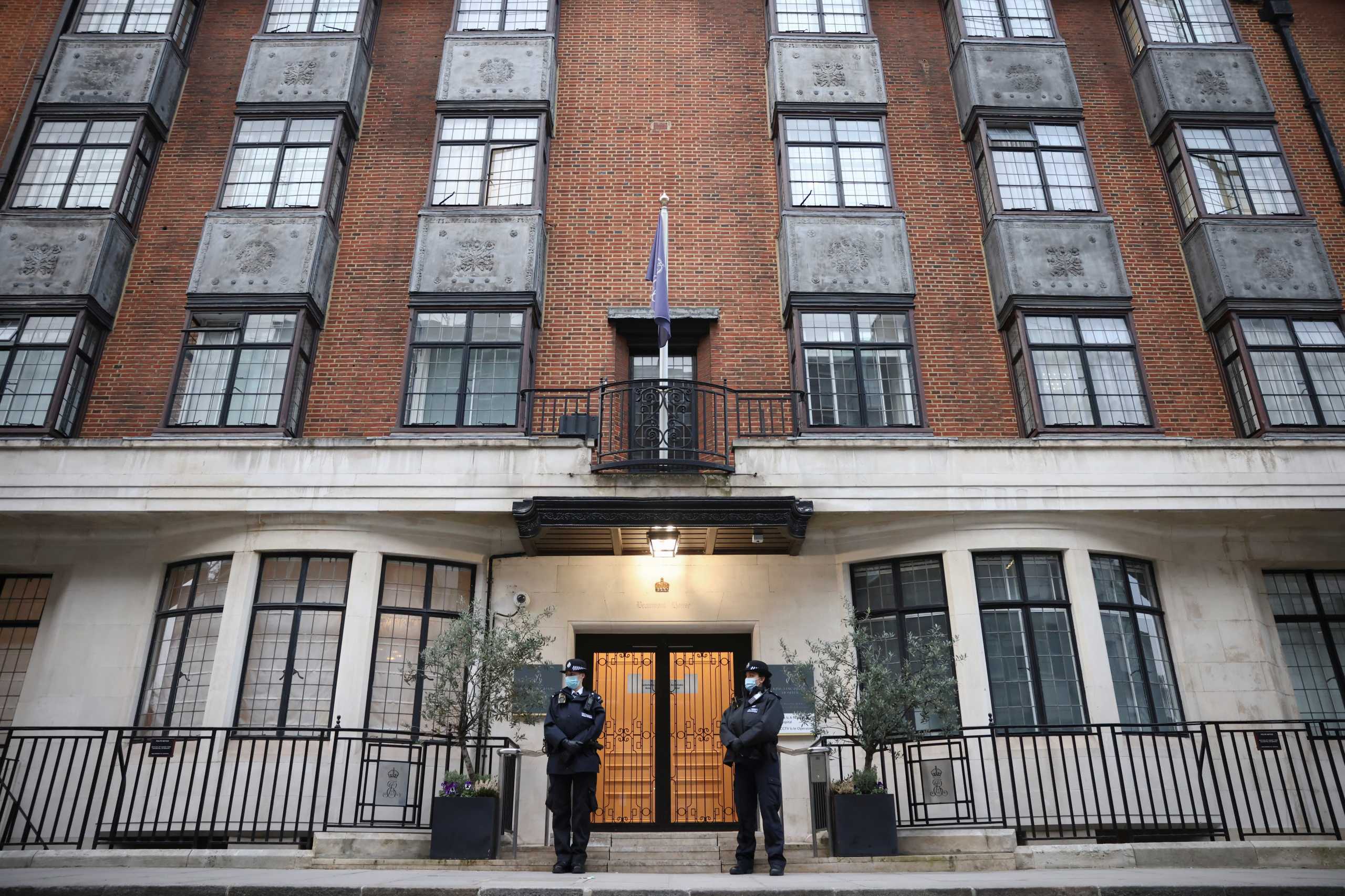 Police officers stand outside King Edward VII's Hospital, where Britain's Prince Philip was admitted in London, Britain, March 1, 2021. REUTERS
