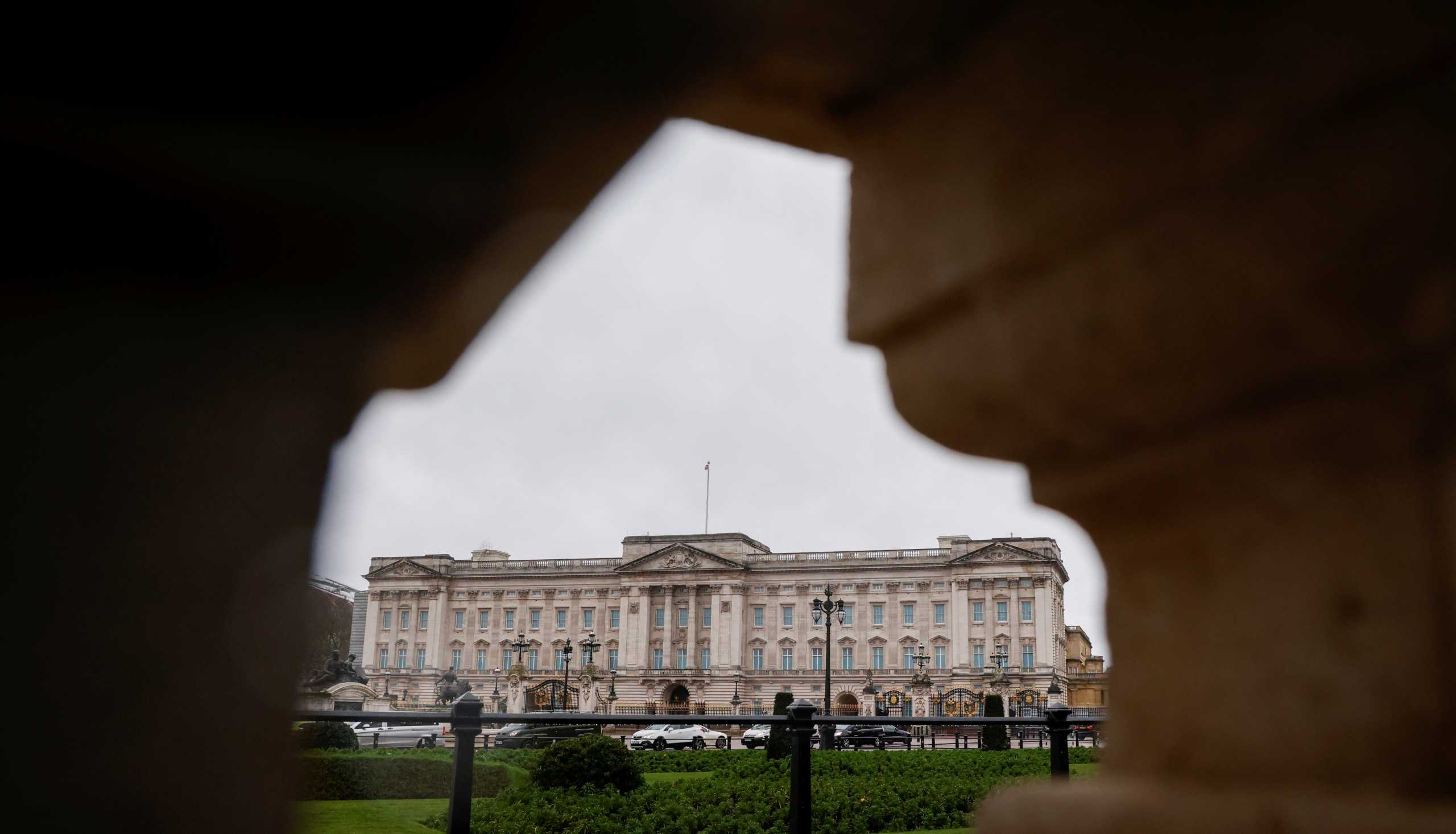 Buckingham Palace is seen through an ornamental wall as reaction continues after Prince Harry and Meghan Markle's interview with Oprah Winfrey in London, Britain, March 10, 2021. REUTERS