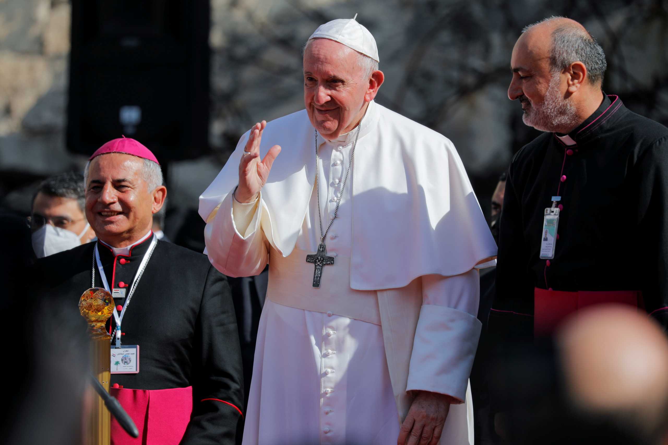 Pope Francis waves during a pray for war victims at 'Hosh al-Bieaa', Church Square, in Mosul's Old City, Iraq, March 7, 2021. REUTERS