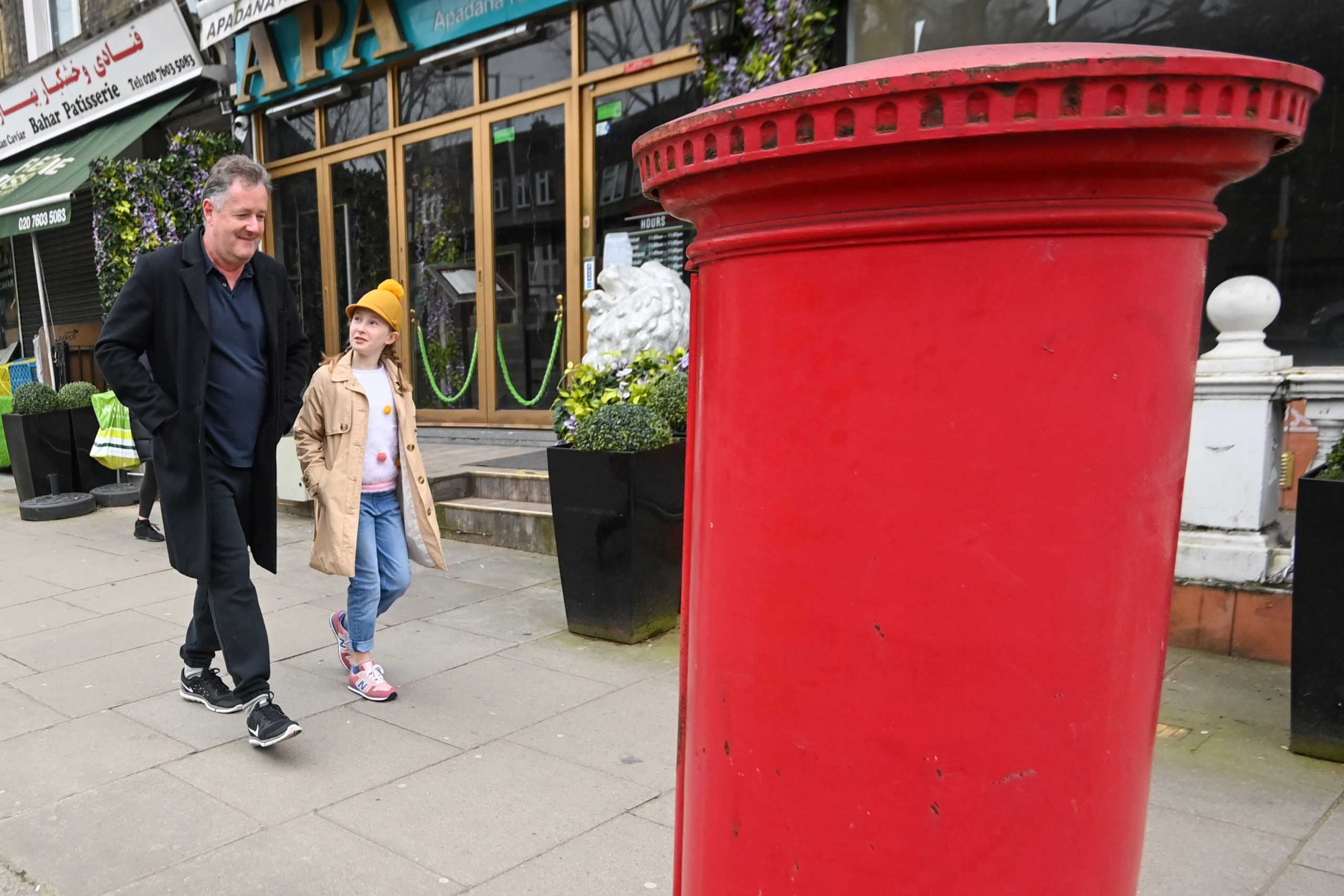 Journalist and television presenter Piers Morgan takes his daughter Elise to school, after he left his high-profile breakfast slot with the broadcaster ITV, following his long-running criticism of Prince Harry's wife Meghan, in London, Britain, March 10, 2021. REUTERS