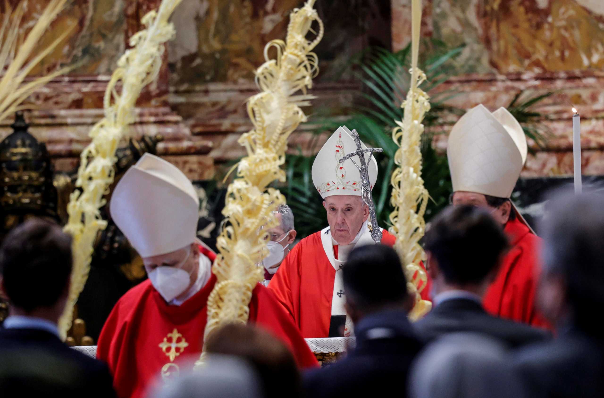 Pope Francis attends a mass on Palm Sunday, amid coronavirus disease (COVID-19) restrictions, in St. Peter's Basilica at the Vatican, March 28, 2021. Giuseppe Lami