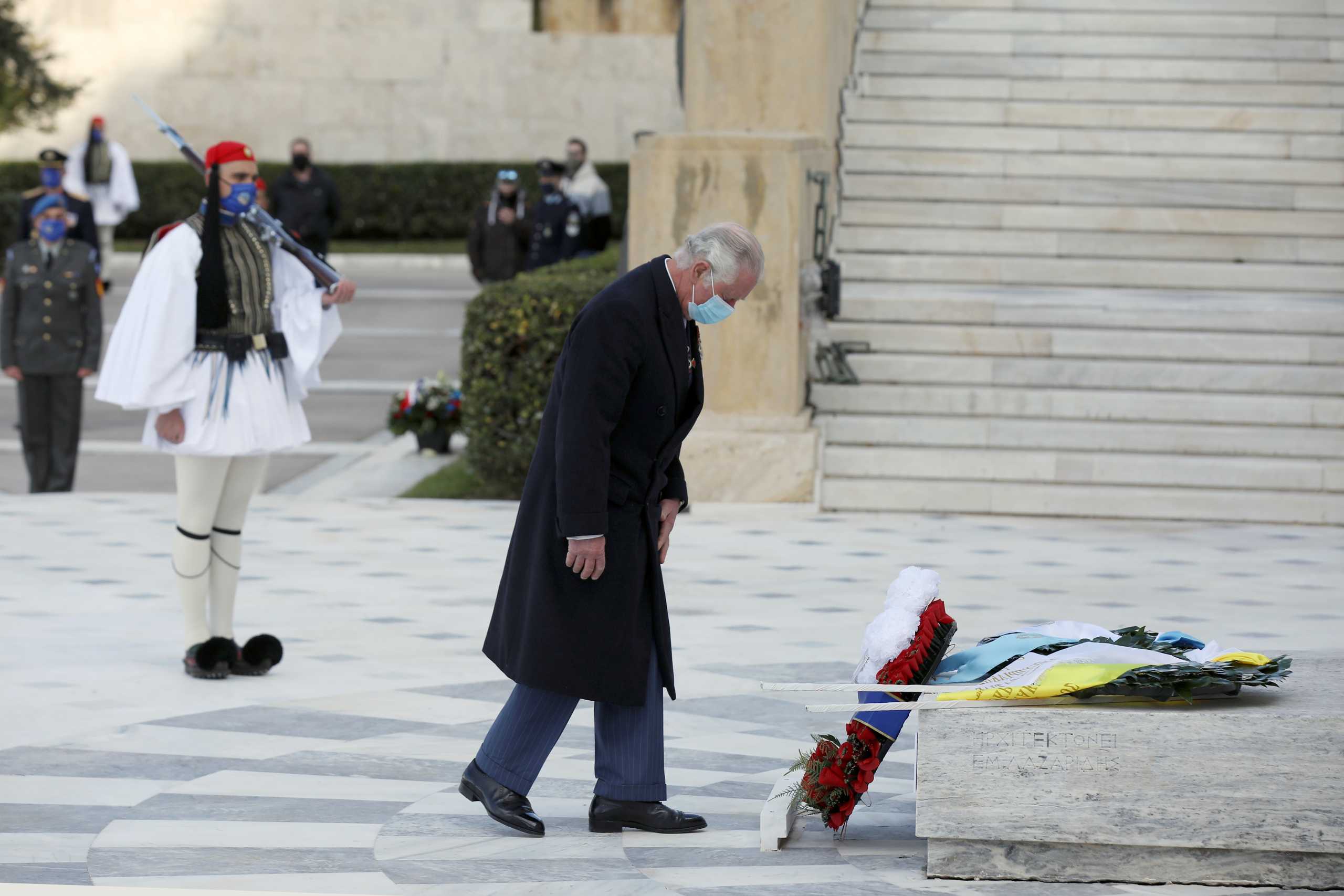 Britain's Prince Charles lays a wreath on the Tomb of the Unknown Soldier during celebrations for the 200th anniversary of the Greek War of Independence, in Athens, Greece March 25, 2021. REUTERS